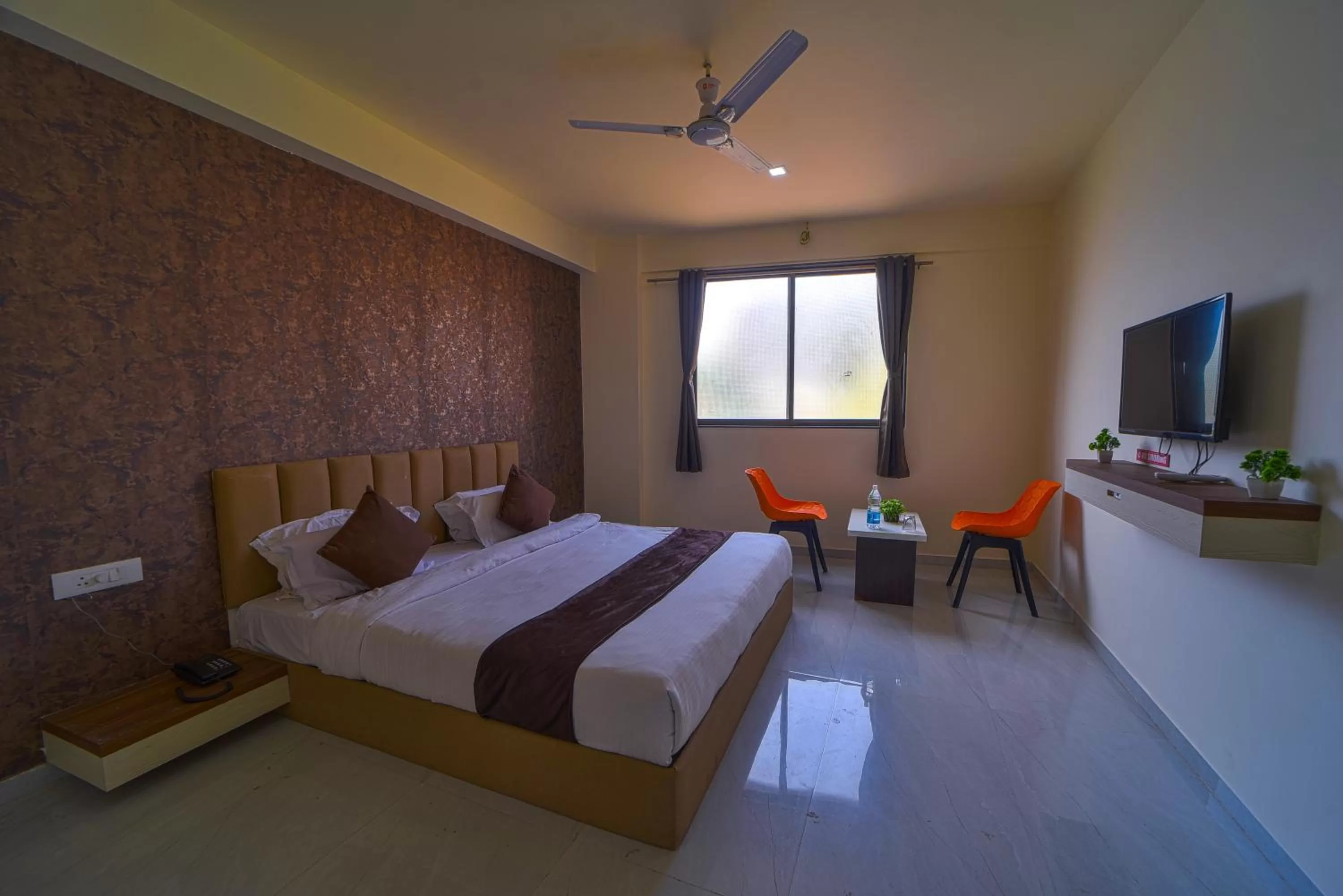 Bed in Hotel Jurkis, Kolhapur