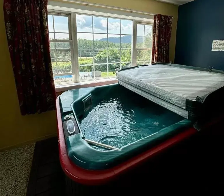 Hot Tub in Swiss Chalets Village Inn