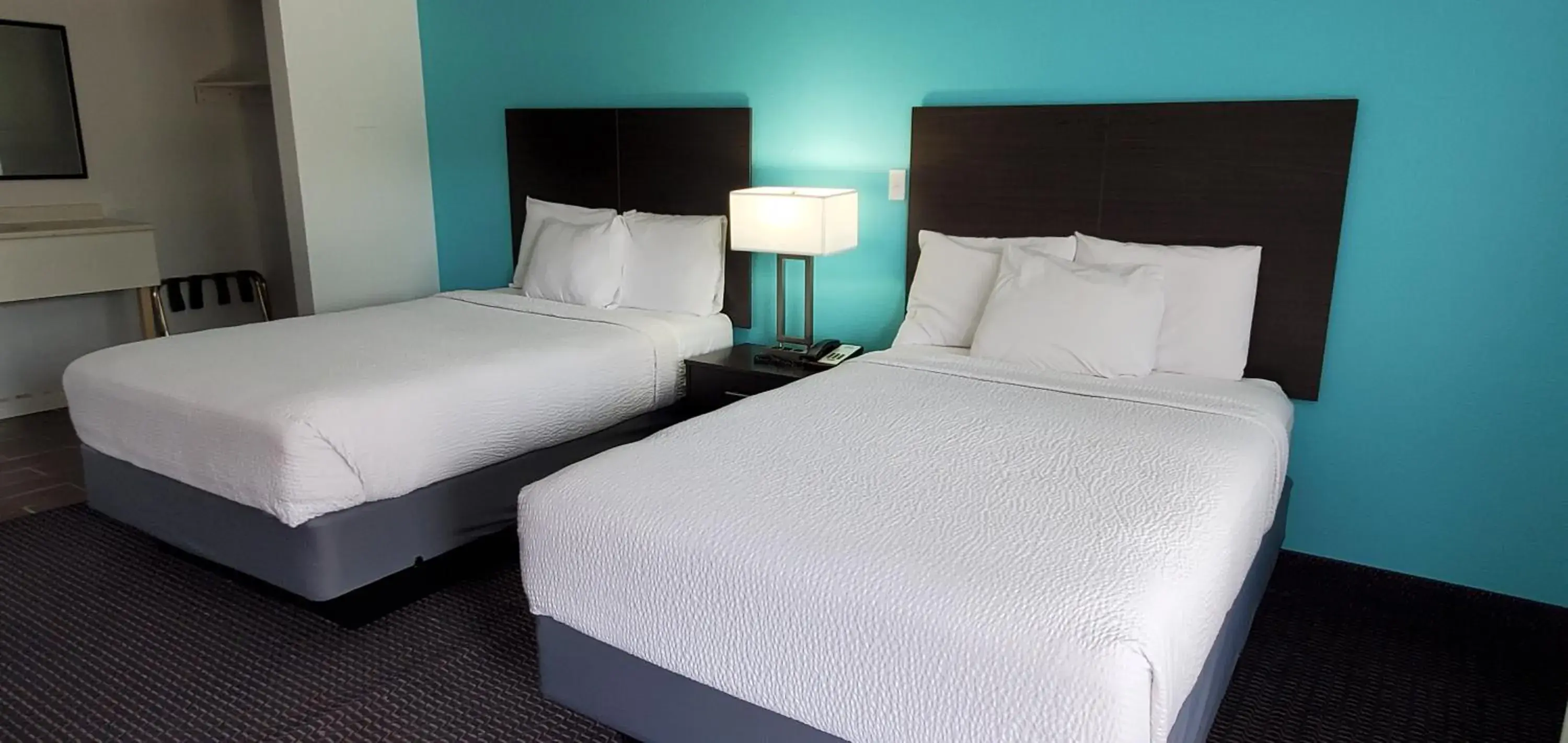 Bed in Travelodge by Wyndham Livonia Canton Novi Detroit Area