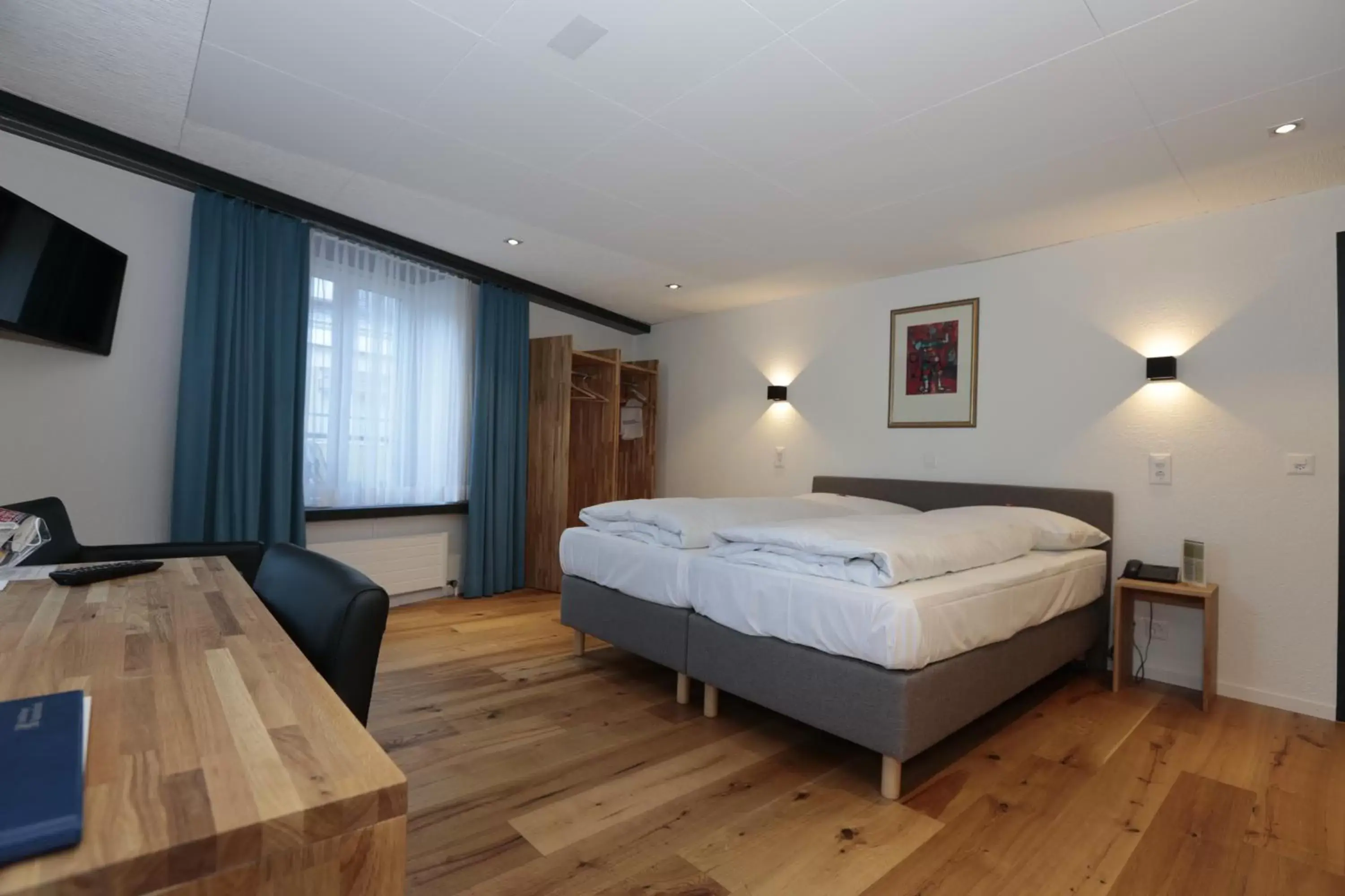 Photo of the whole room, Bed in HotelChur.ch