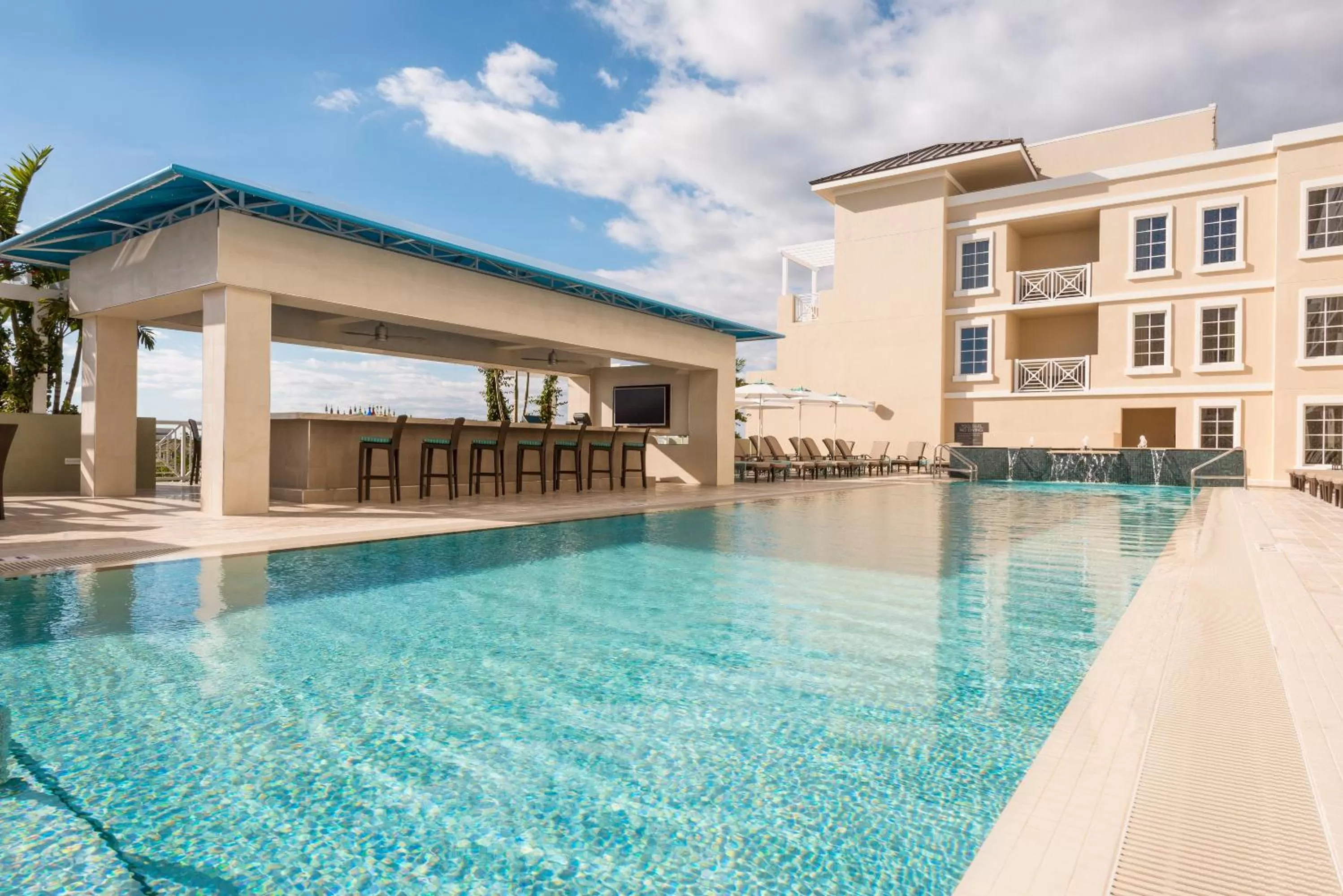 Swimming pool in Wyndham Grand Jupiter at Harbourside Place