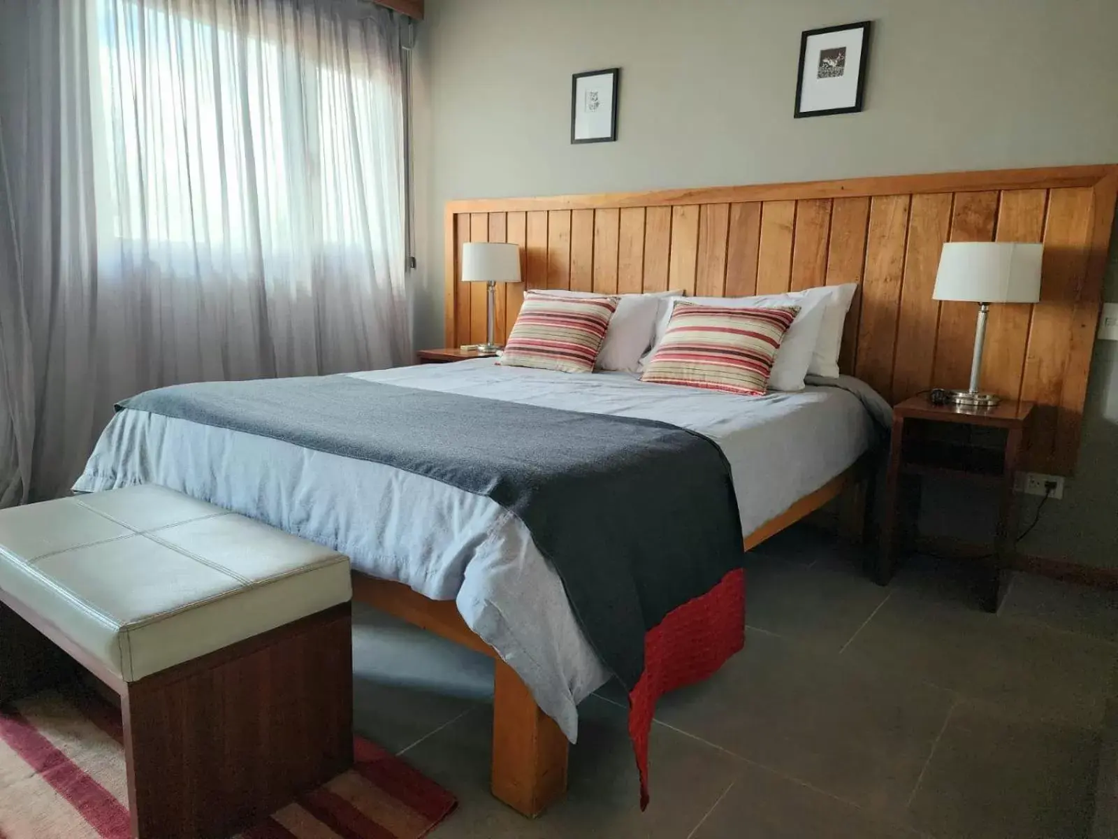 Bed in Las Bayas Home Suites
