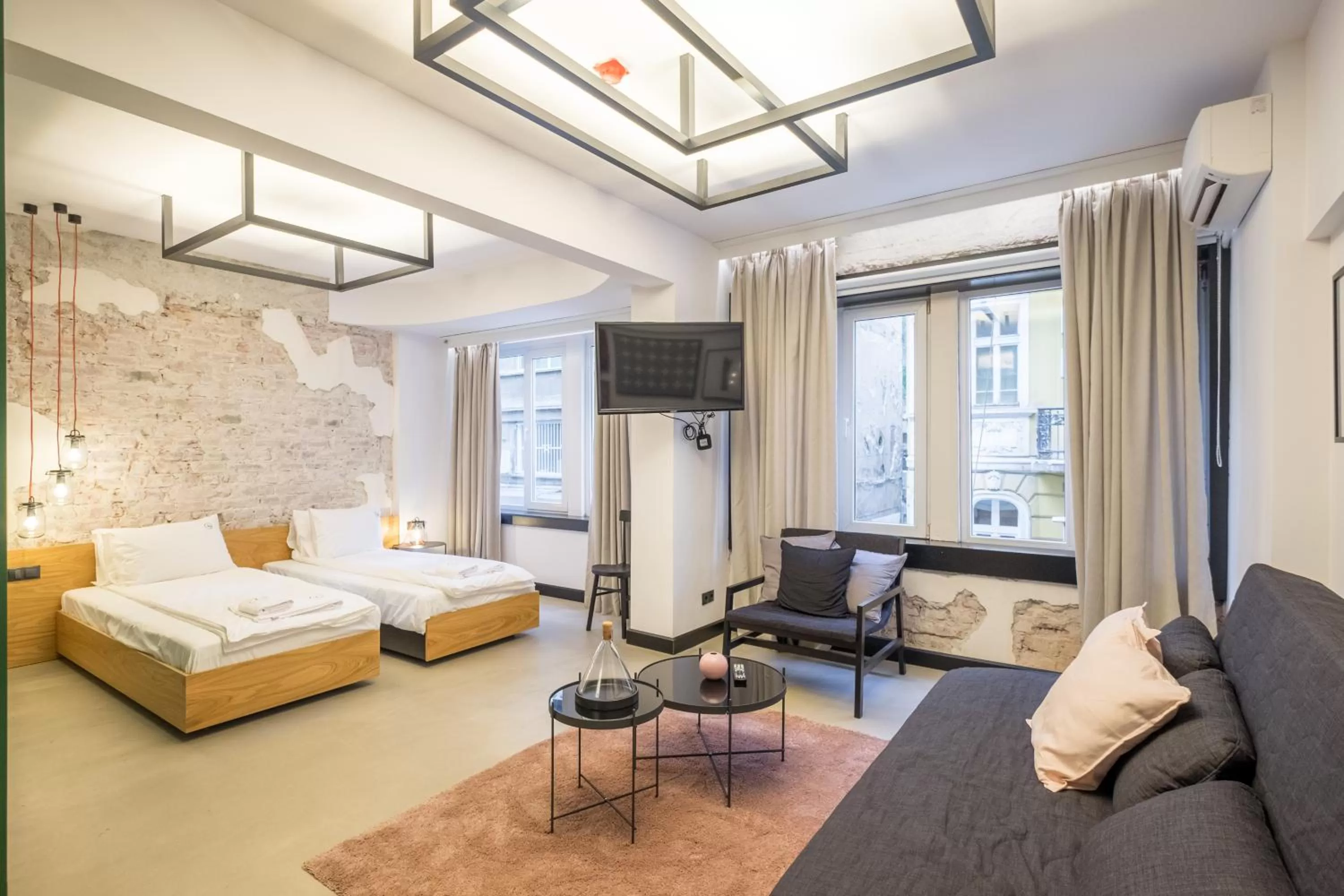 Bed in R34 Boutique Hotel