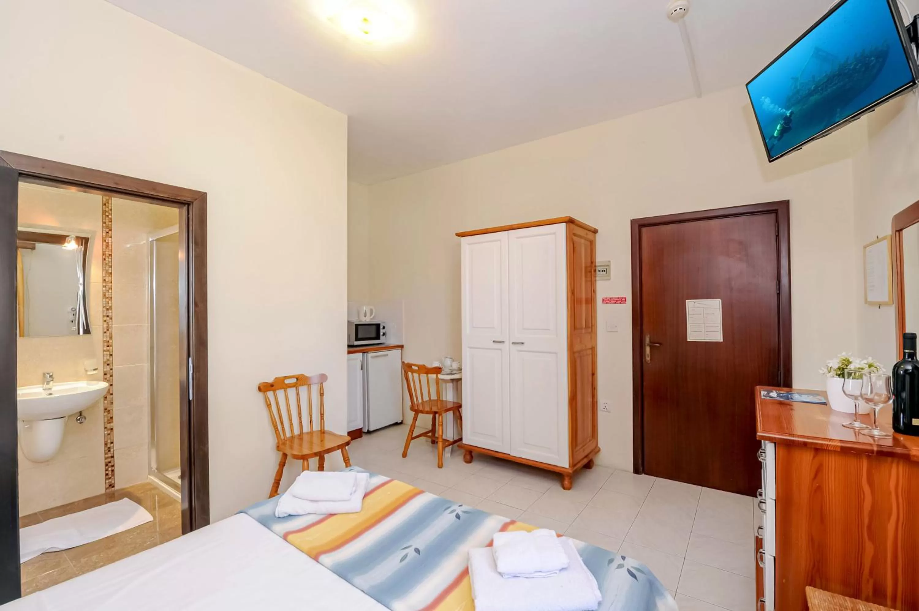 Bed in Mariblu Hotel