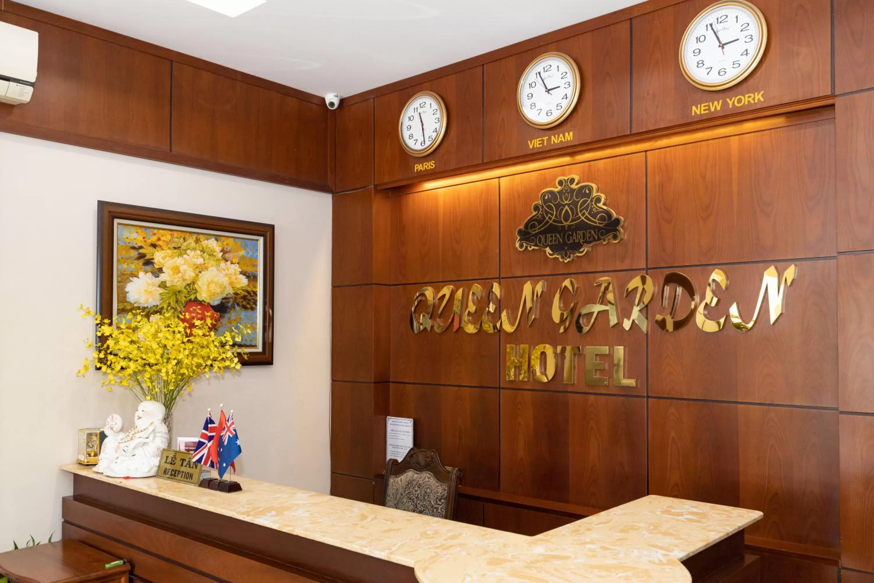 Property logo or sign in Queen Garden Hotel & Apartment