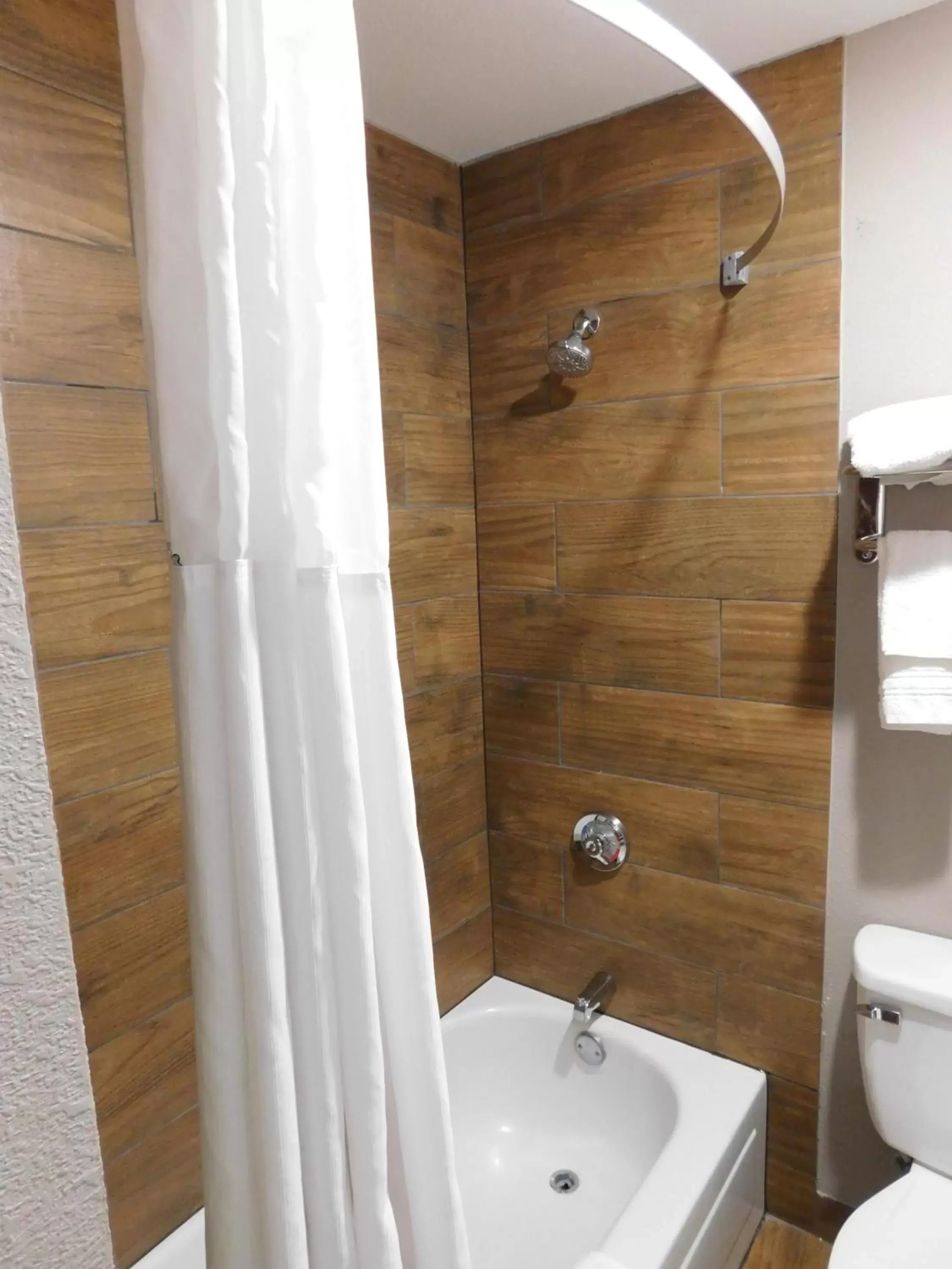 Bathroom in Days Inn by Wyndham West Des Moines - Clive