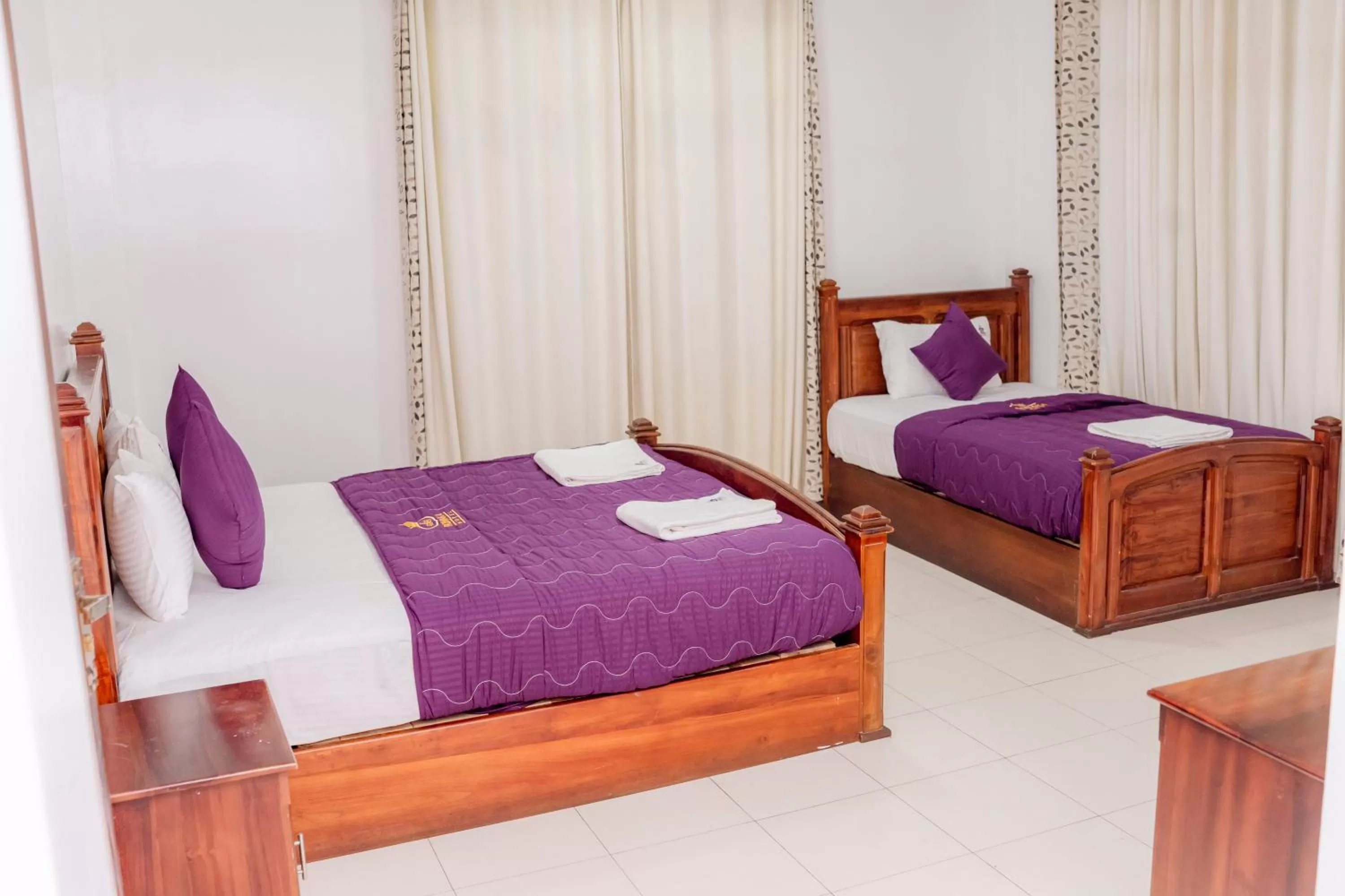 Bed in Ronaka Airport Transit Hotel