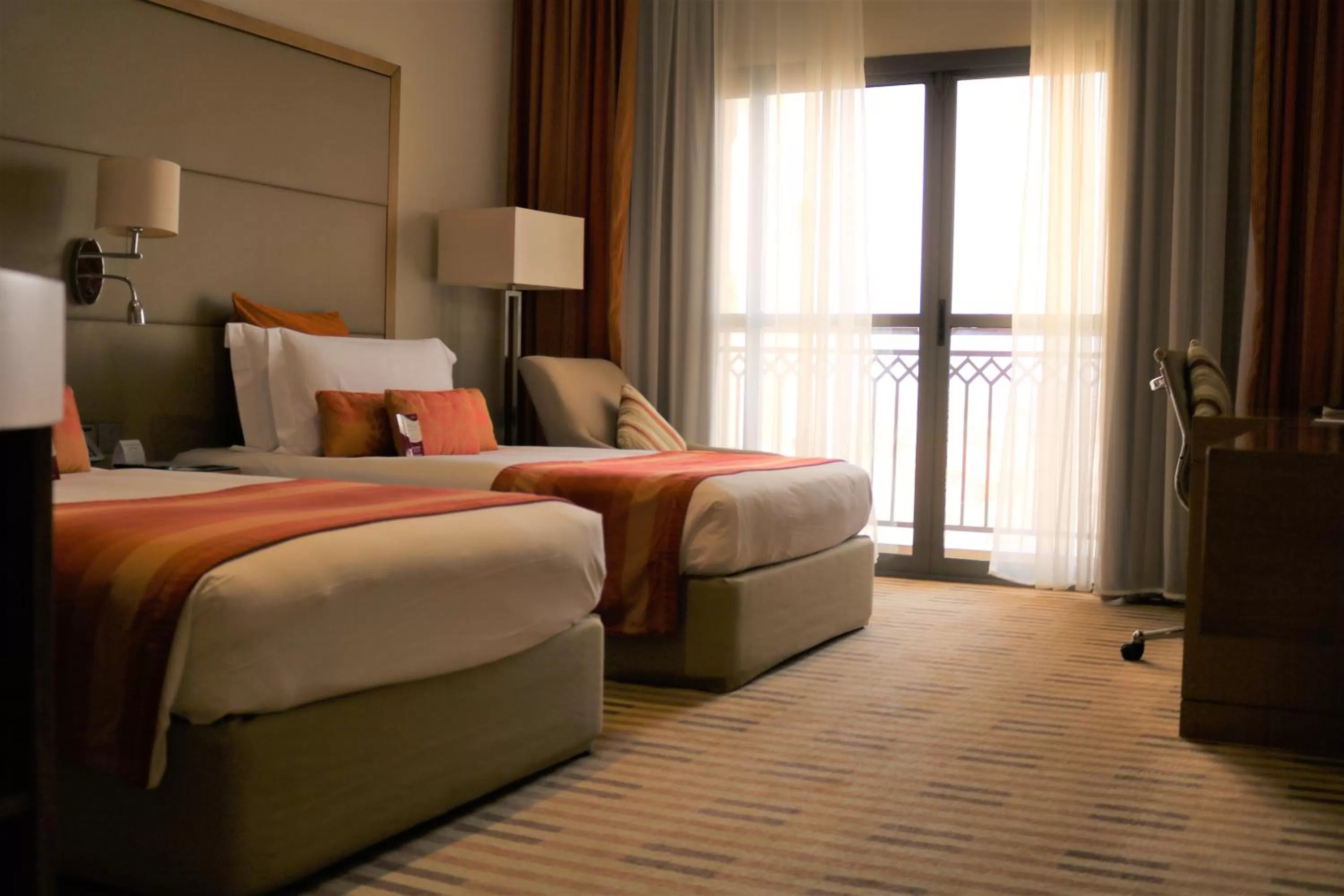 Photo of the whole room, Bed in Crowne Plaza Sohar by IHG