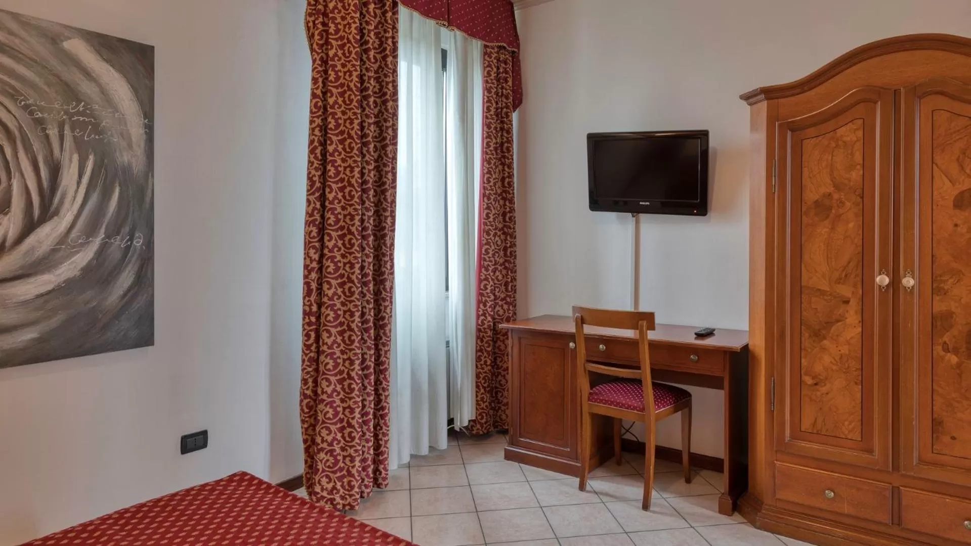 Bedroom in Primotel Brescia