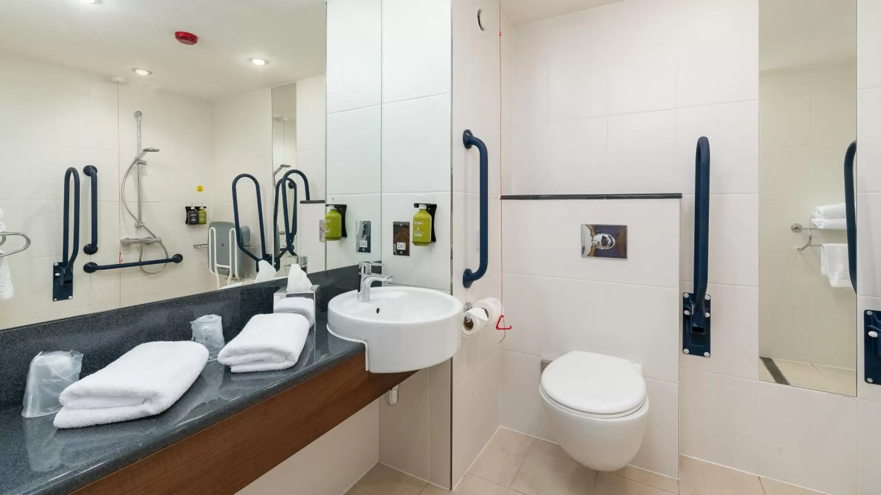 acessibility, Bathroom in Holiday Inn Express Leigh - Sports Village, an IHG Hotel