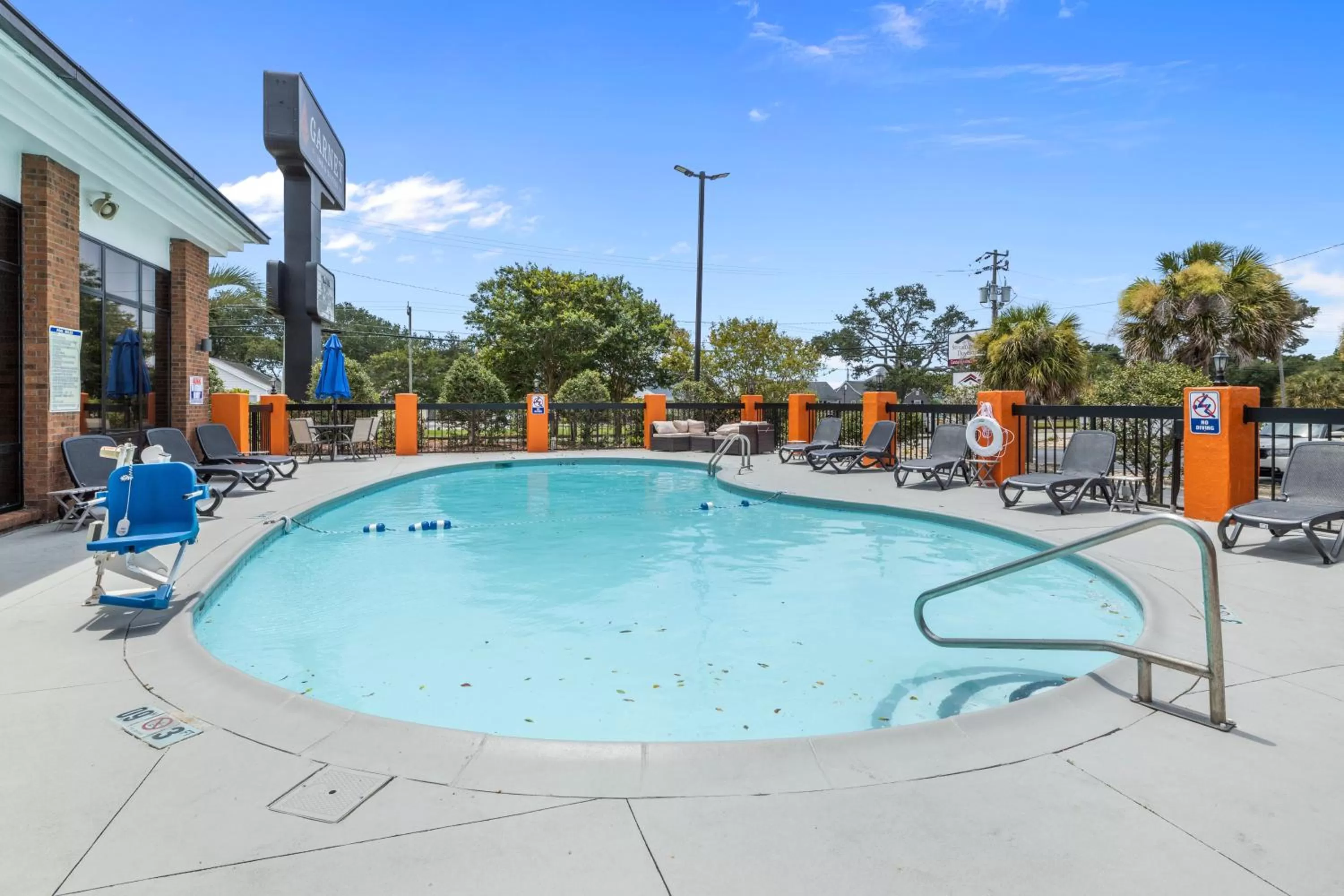 Swimming pool in Garnet Inn & Suites, Morehead City near Atlantic Beach