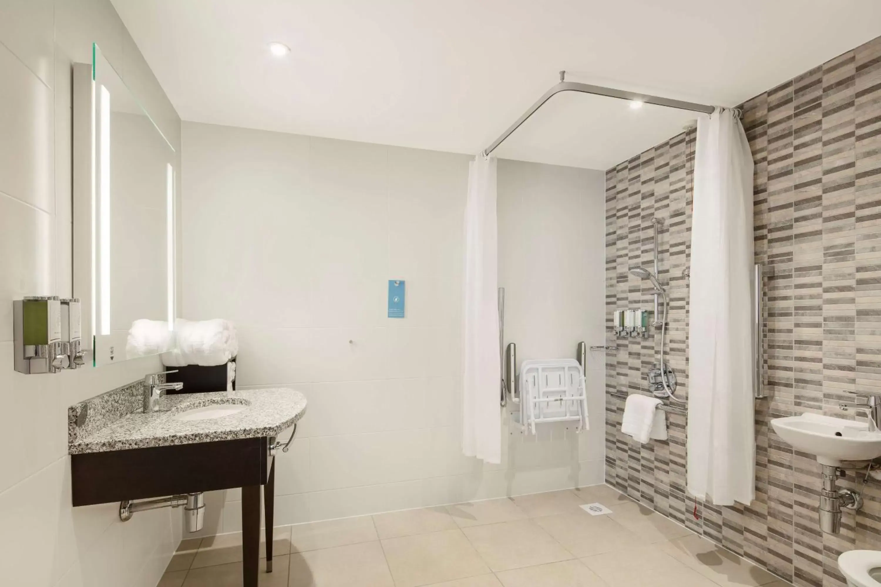 Bathroom in Hampton By Hilton London Stansted Airport