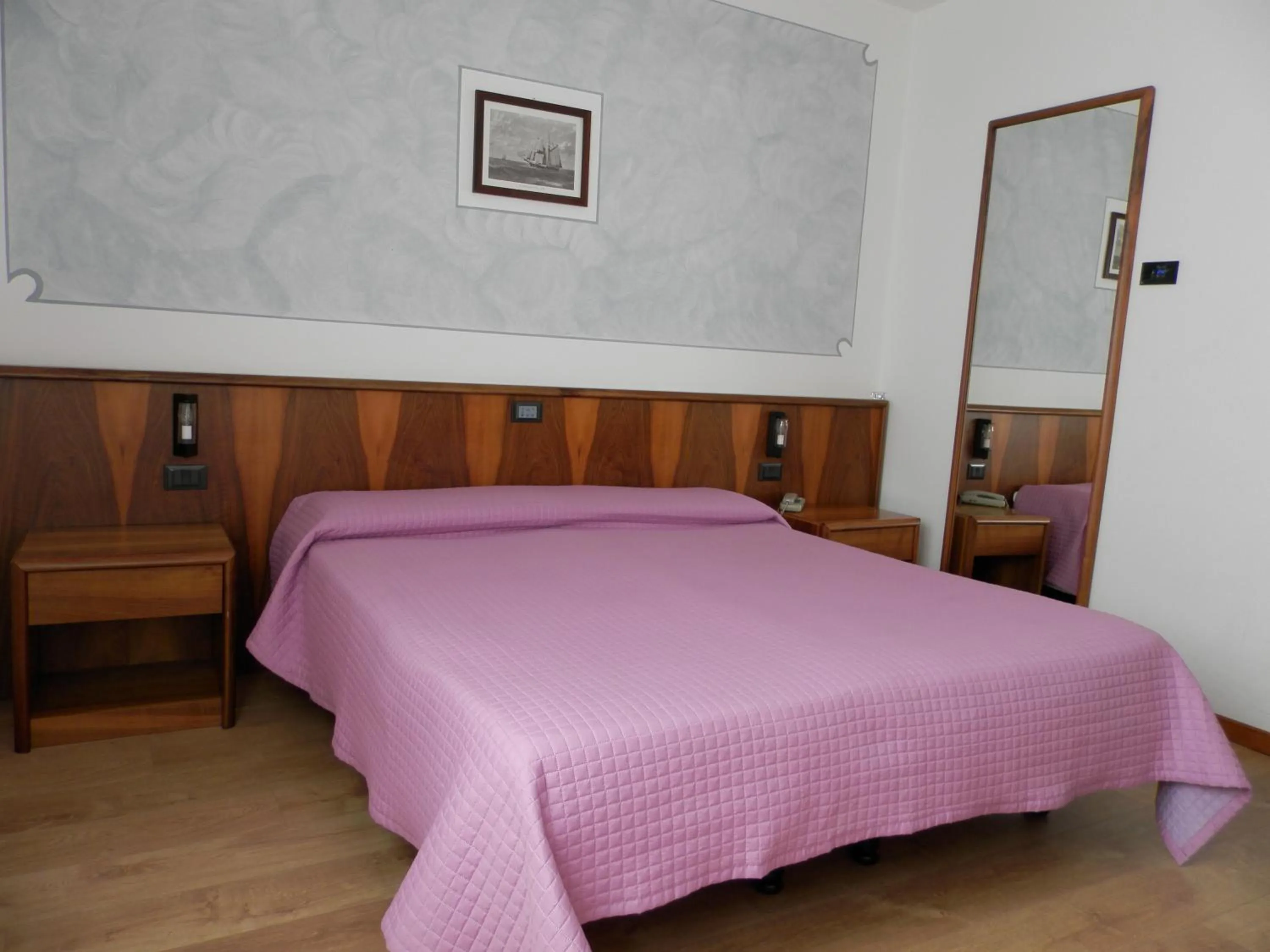 Bed in Continental Hotel