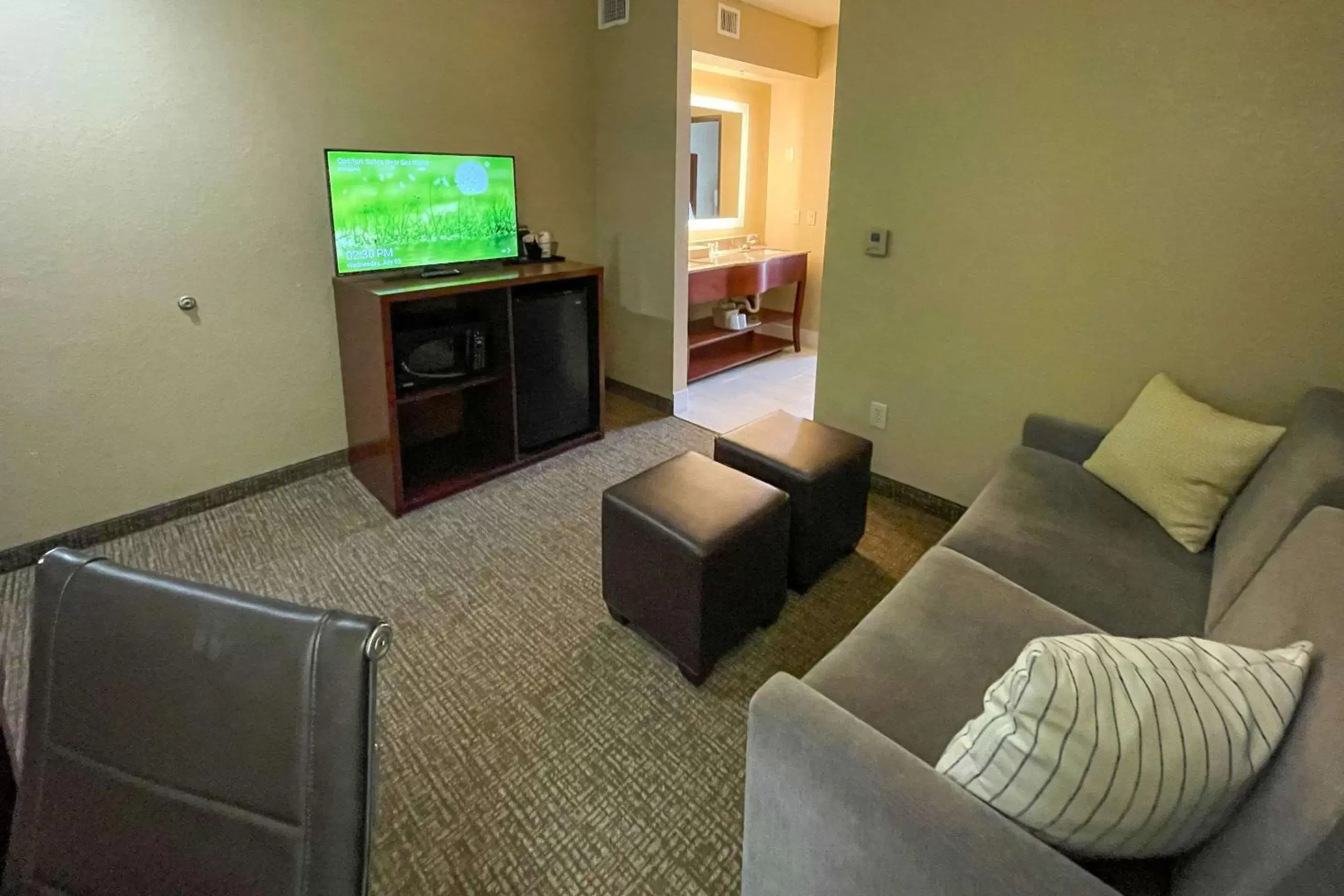 Bedroom, Seating Area in Comfort Suites Sea World/ Lackland