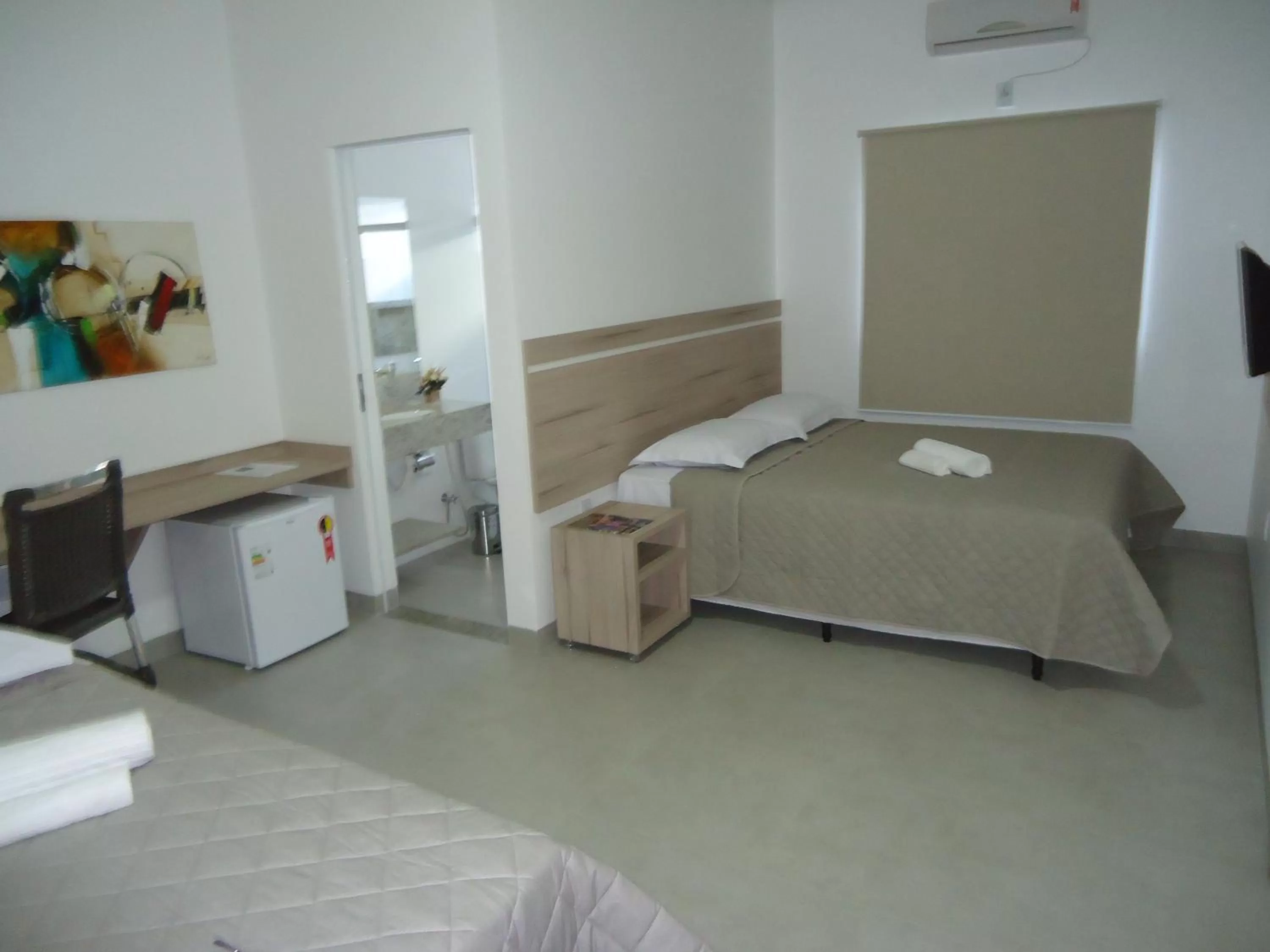 Bed in Hotel Jequitibá