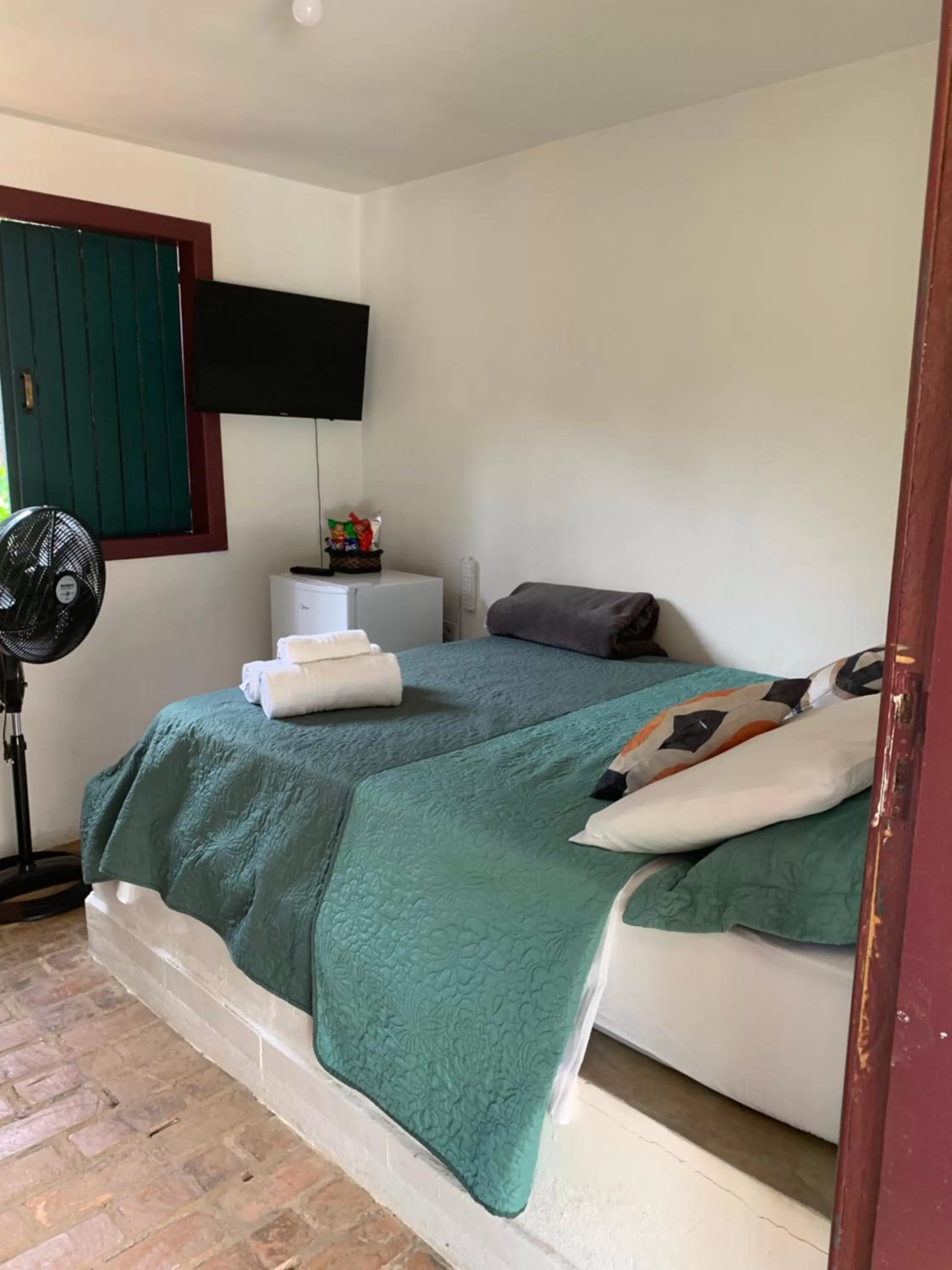 Bed in Pousada Cantinho do Mundo