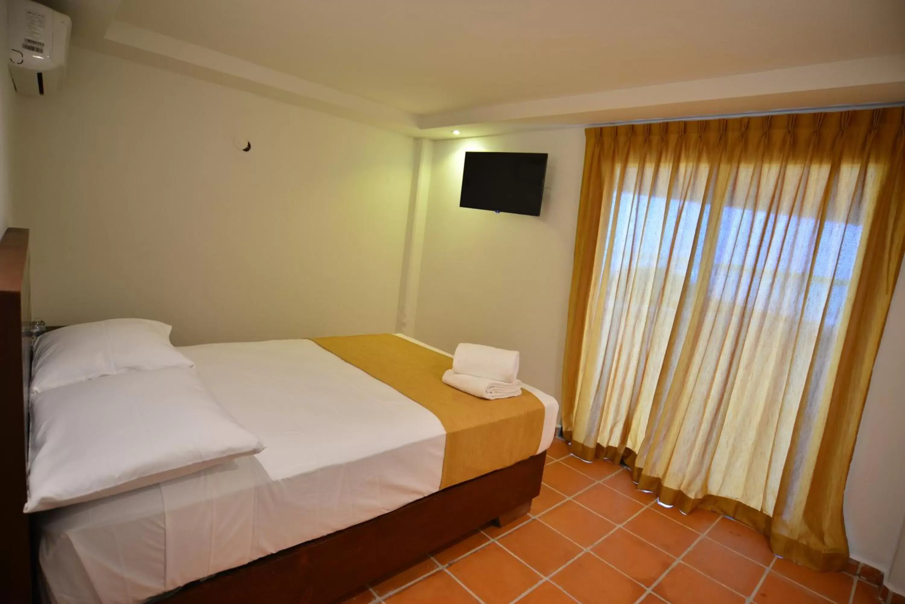 Bed in Hotel Rio Lagartos