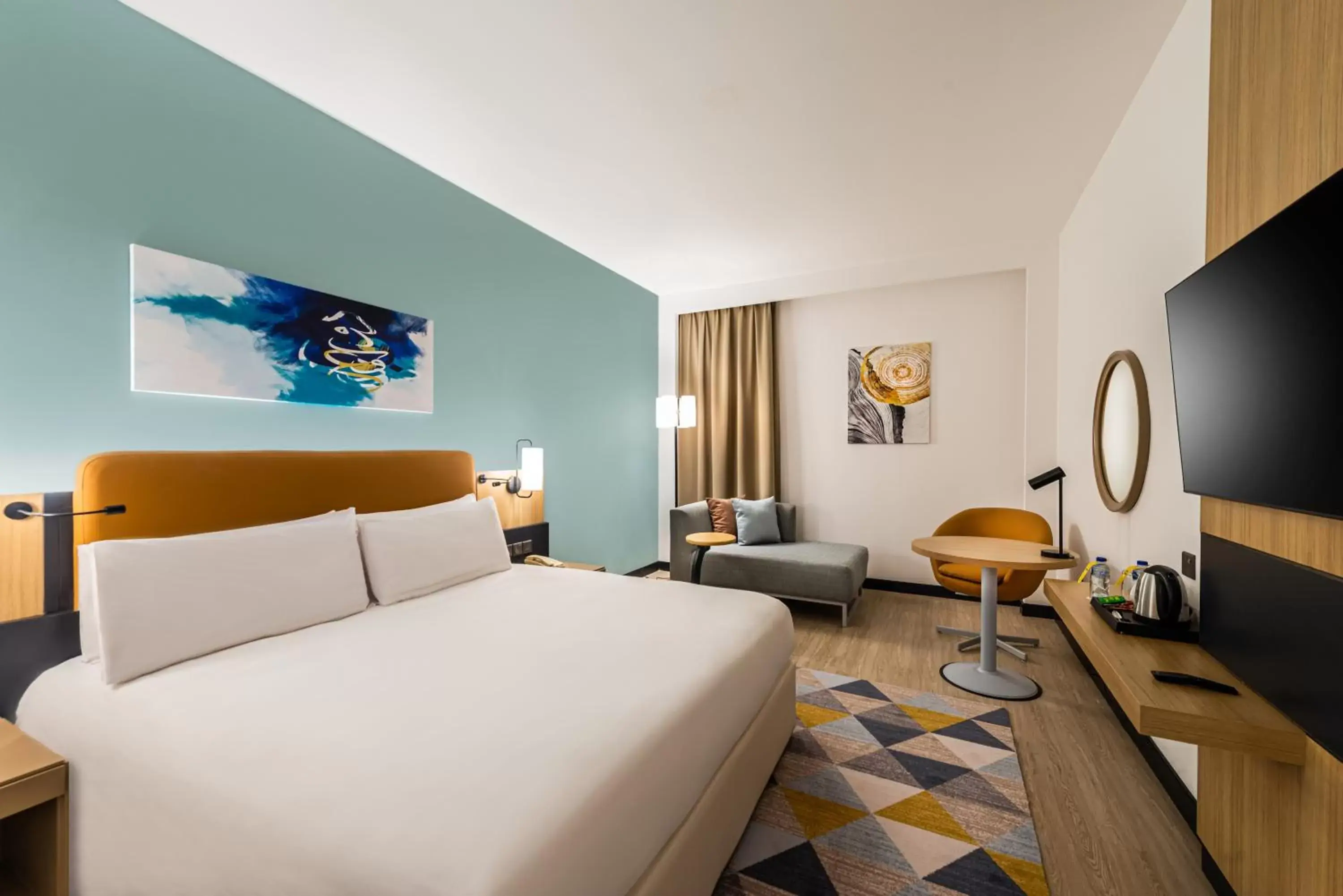 Bed in Holiday Inn Riyadh Al Qasr, an IHG Hotel