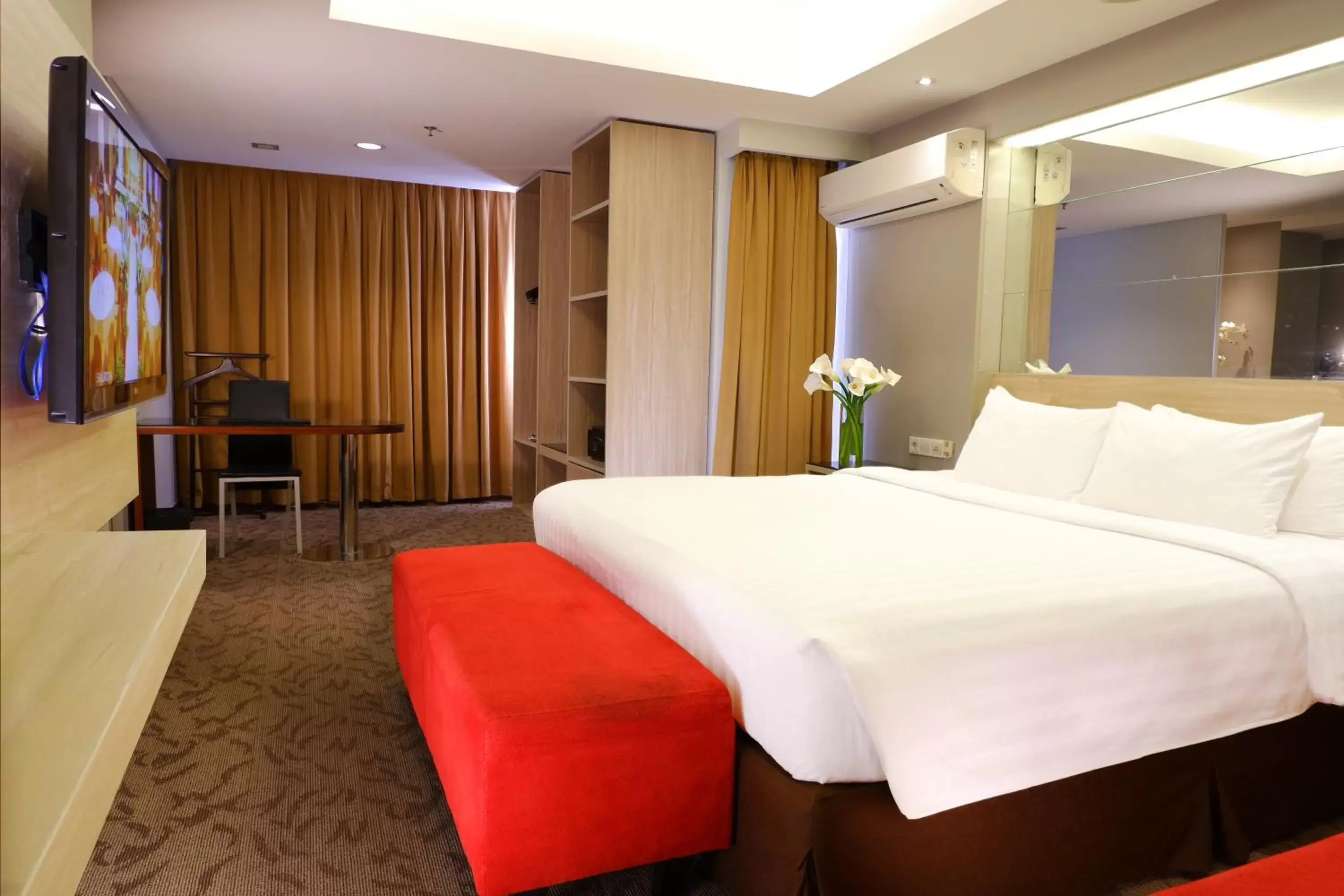 Bed in ASTON Pluit Hotel & Residence