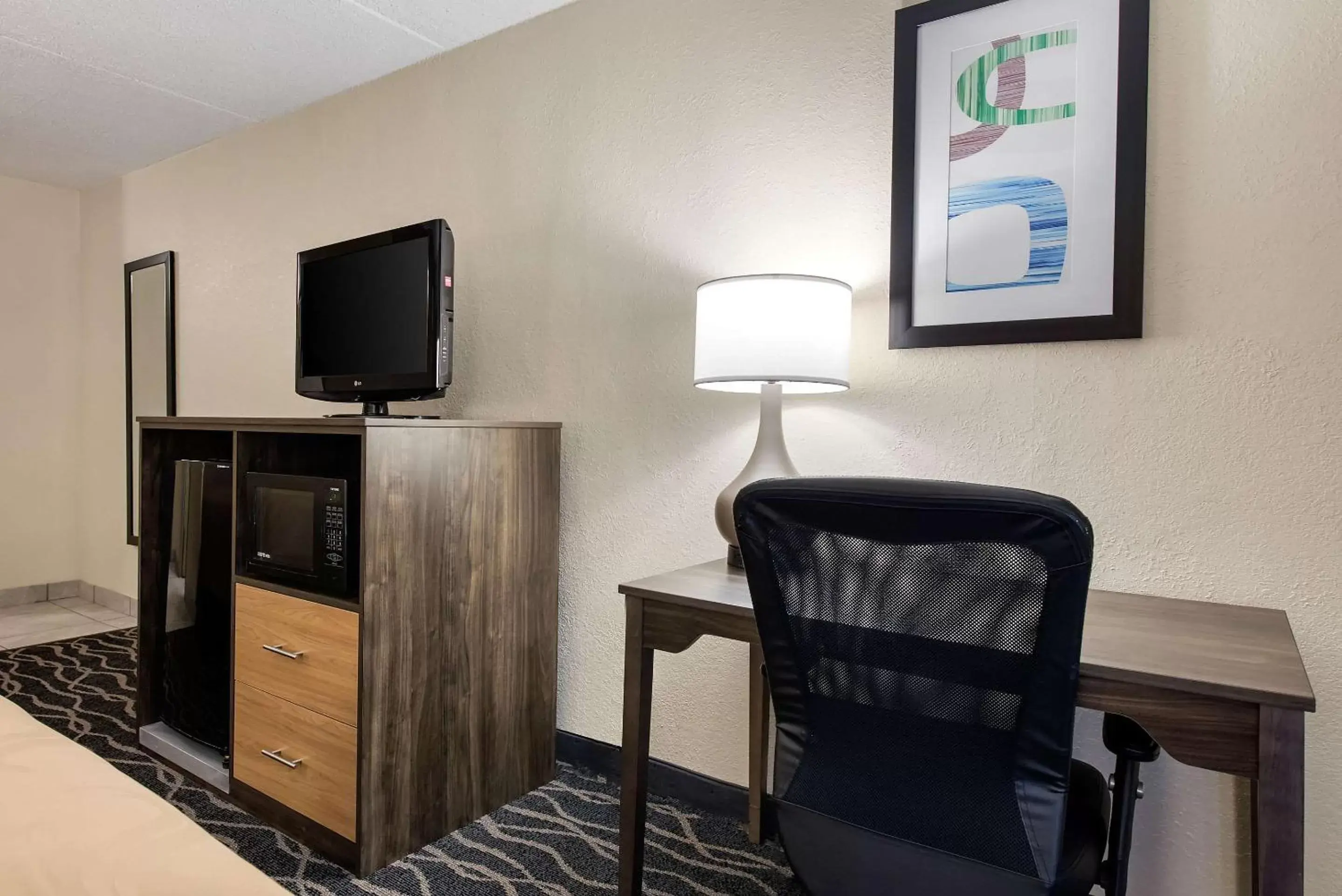 Photo of the whole room, TV/Entertainment Center in Quality Inn & Suites Lafayette I-65