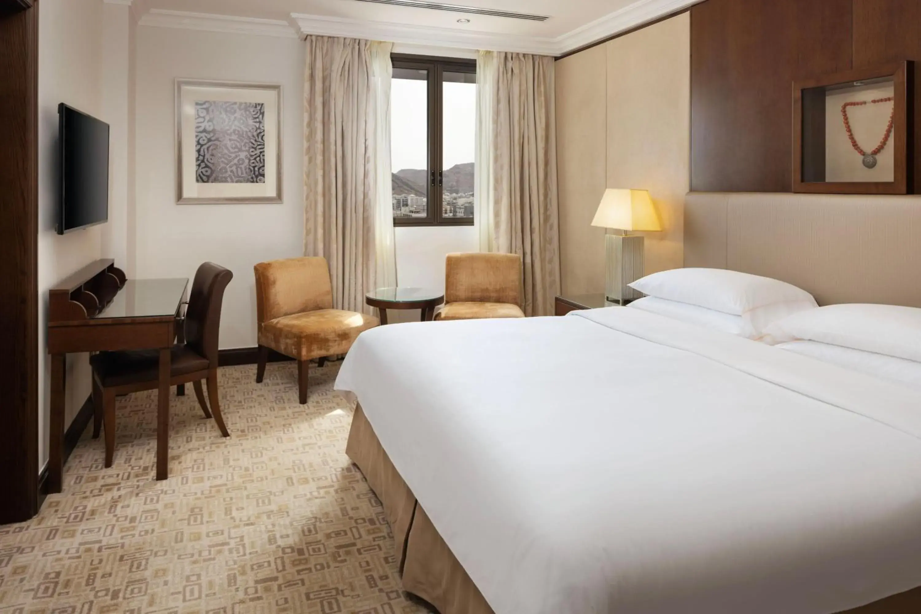 Bedroom in Sheraton Oman Hotel