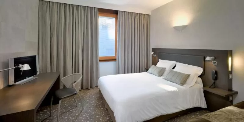 Photo of the whole room, Bed in Hôtel Restaurant Vaillant proche Europapark Rulantica