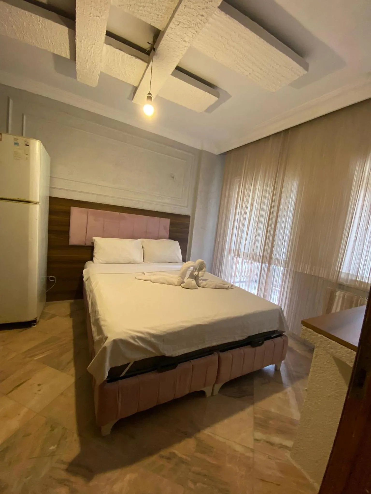 Bed in Aruna Boutique Hotel