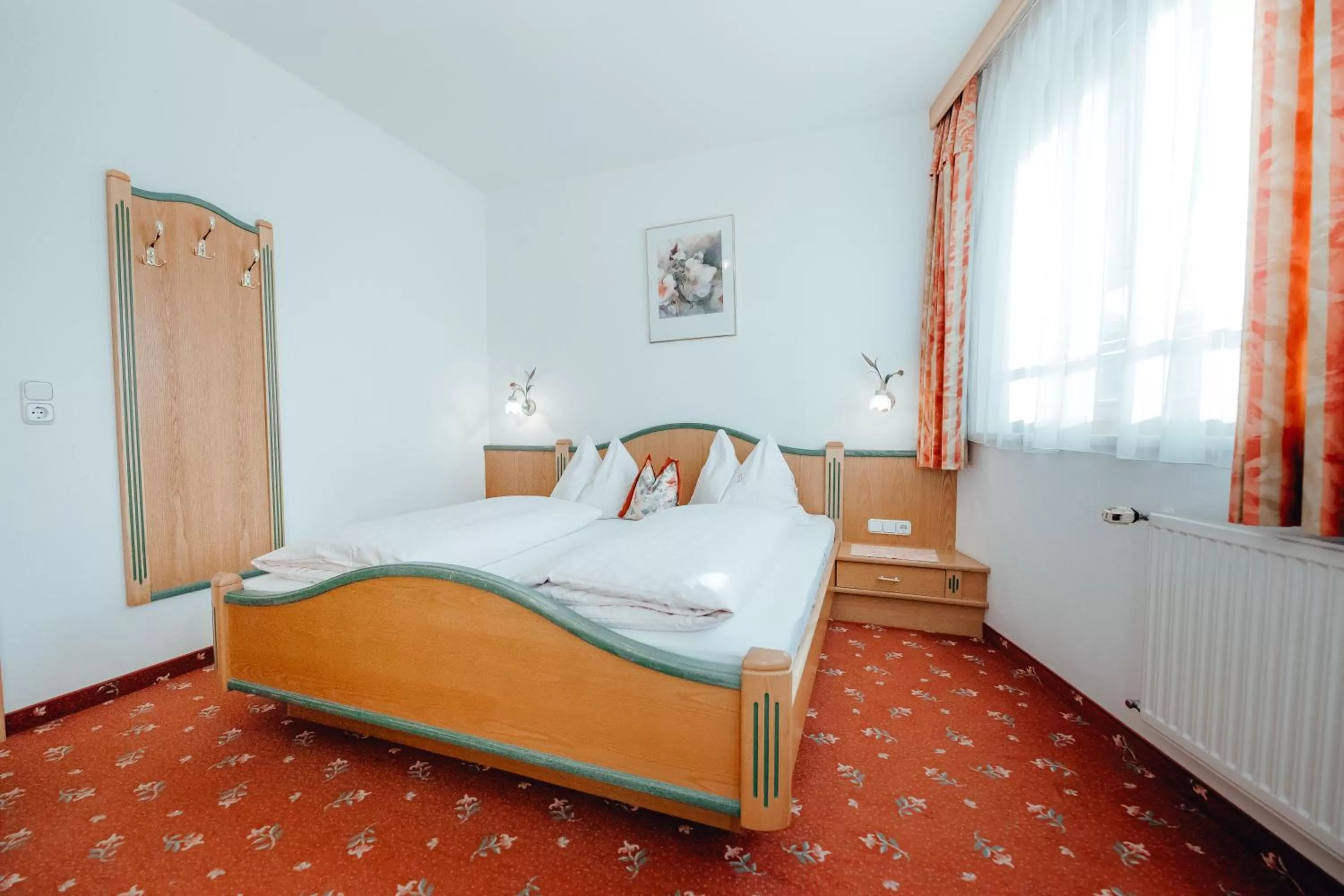 Bed in Zimmer & Ferienwohnungen Dandler