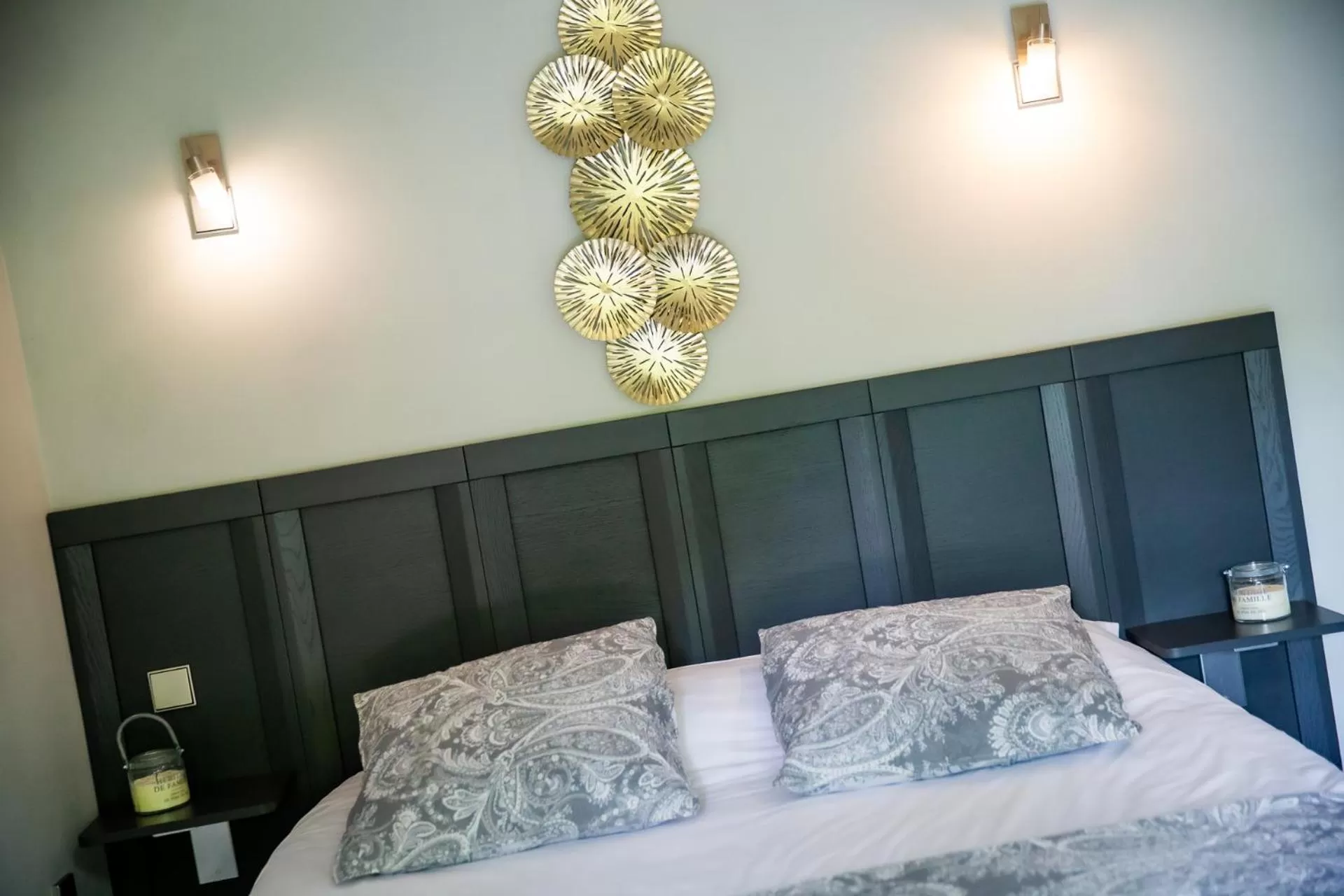 Bed in La Ferme de l'Oudon & SPA