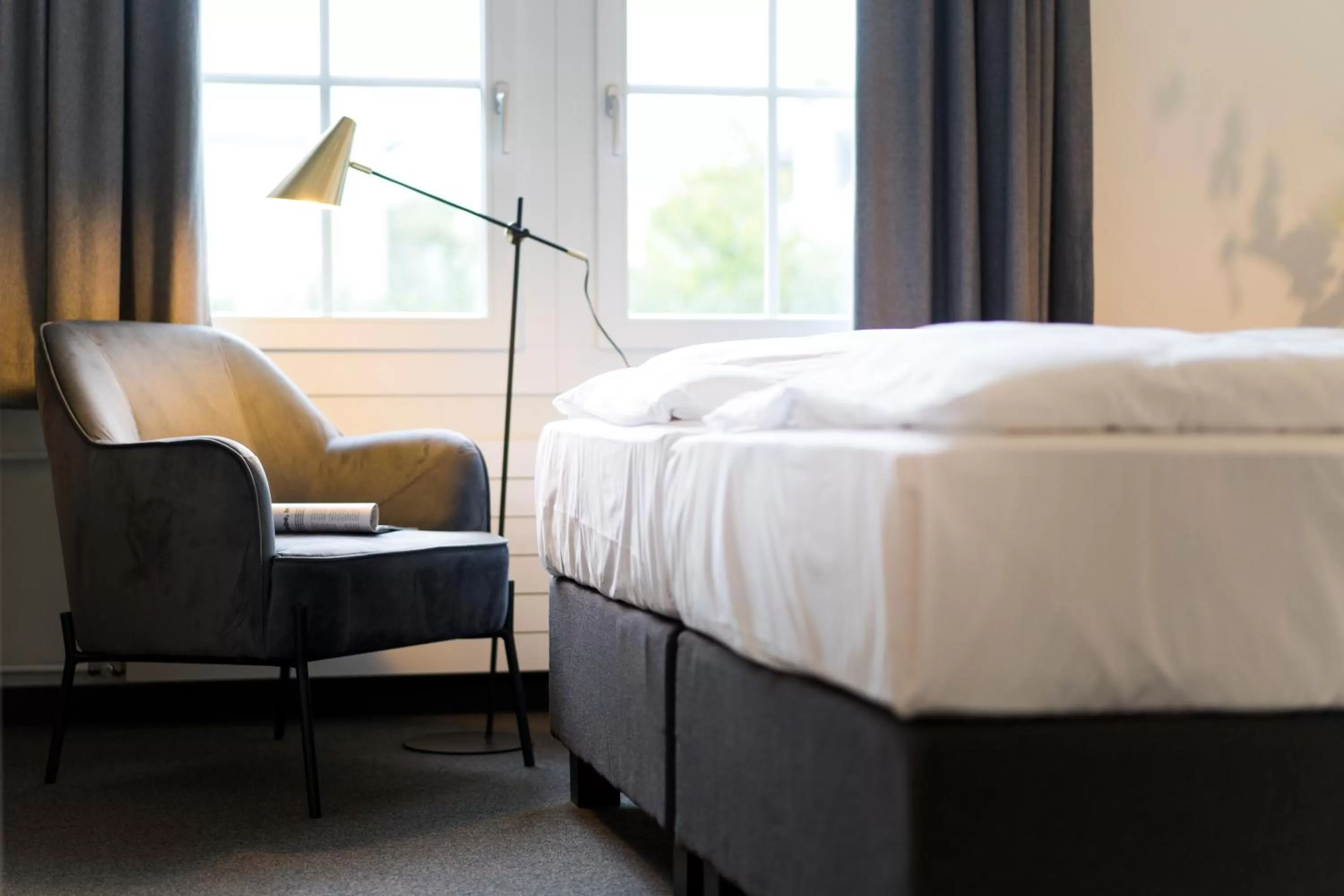 Seating area, Bed in KONCEPT HOTEL Löie