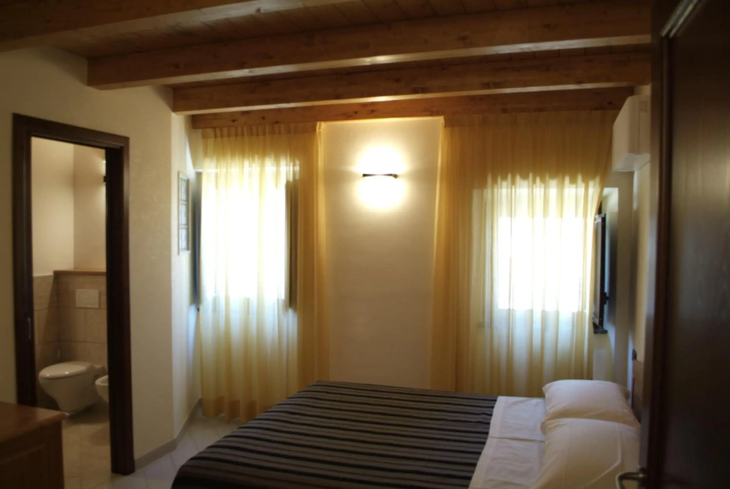 Photo of the whole room, Bed in Locanda Dal Sor Francesco