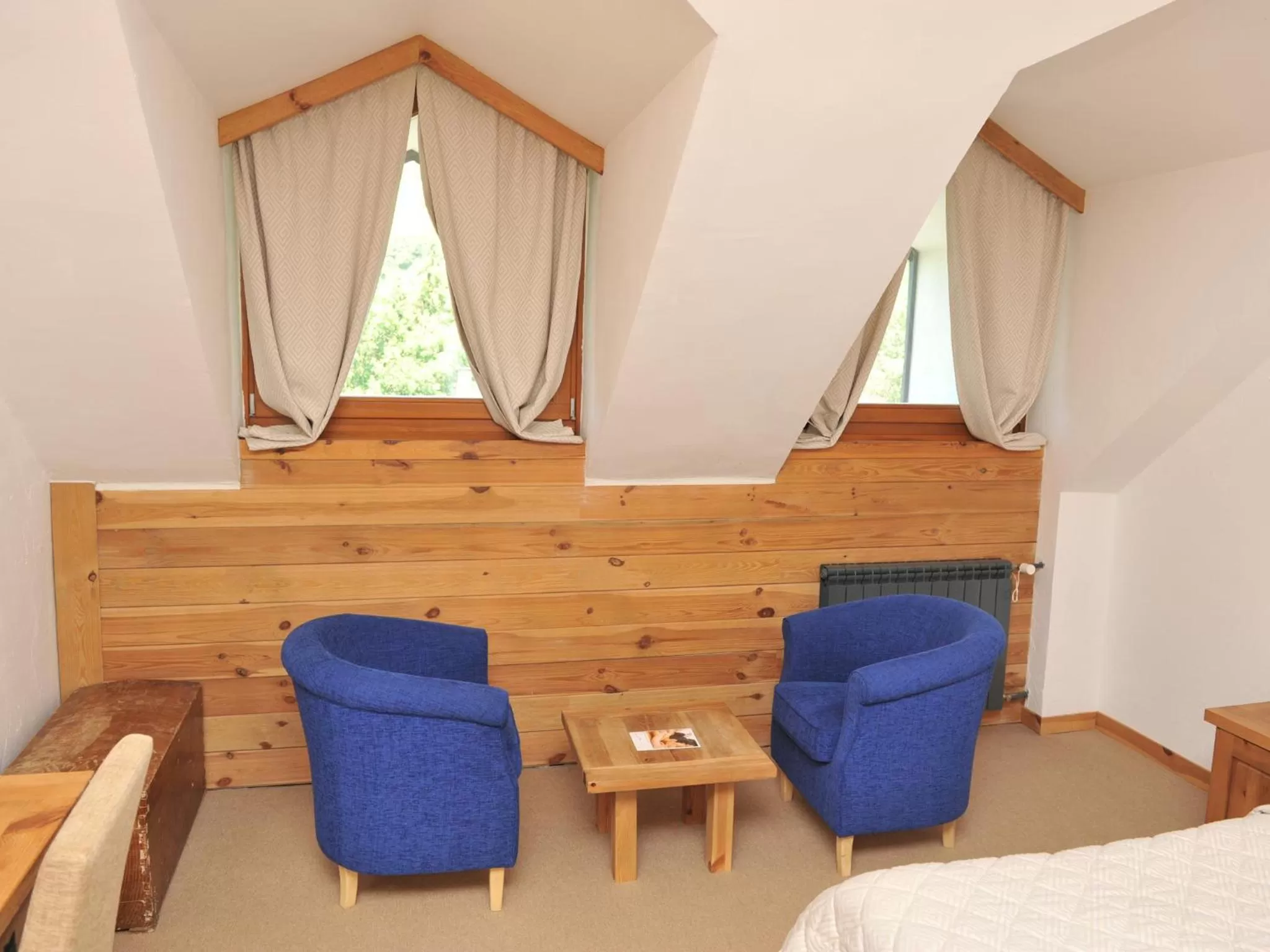 Seating area, Bed in Bianca Resort & Spa