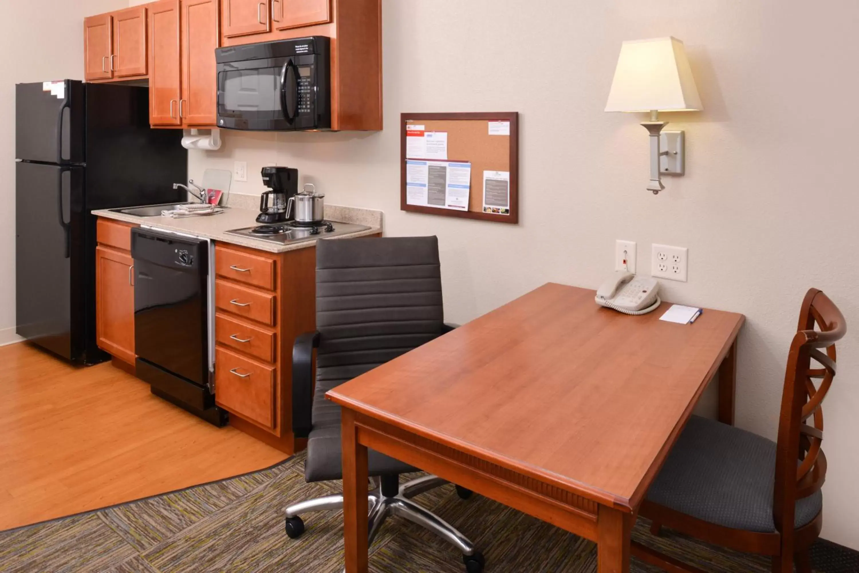 Bedroom, Kitchen/Kitchenette in Candlewood Suites Boise - Towne Square, an IHG Hotel