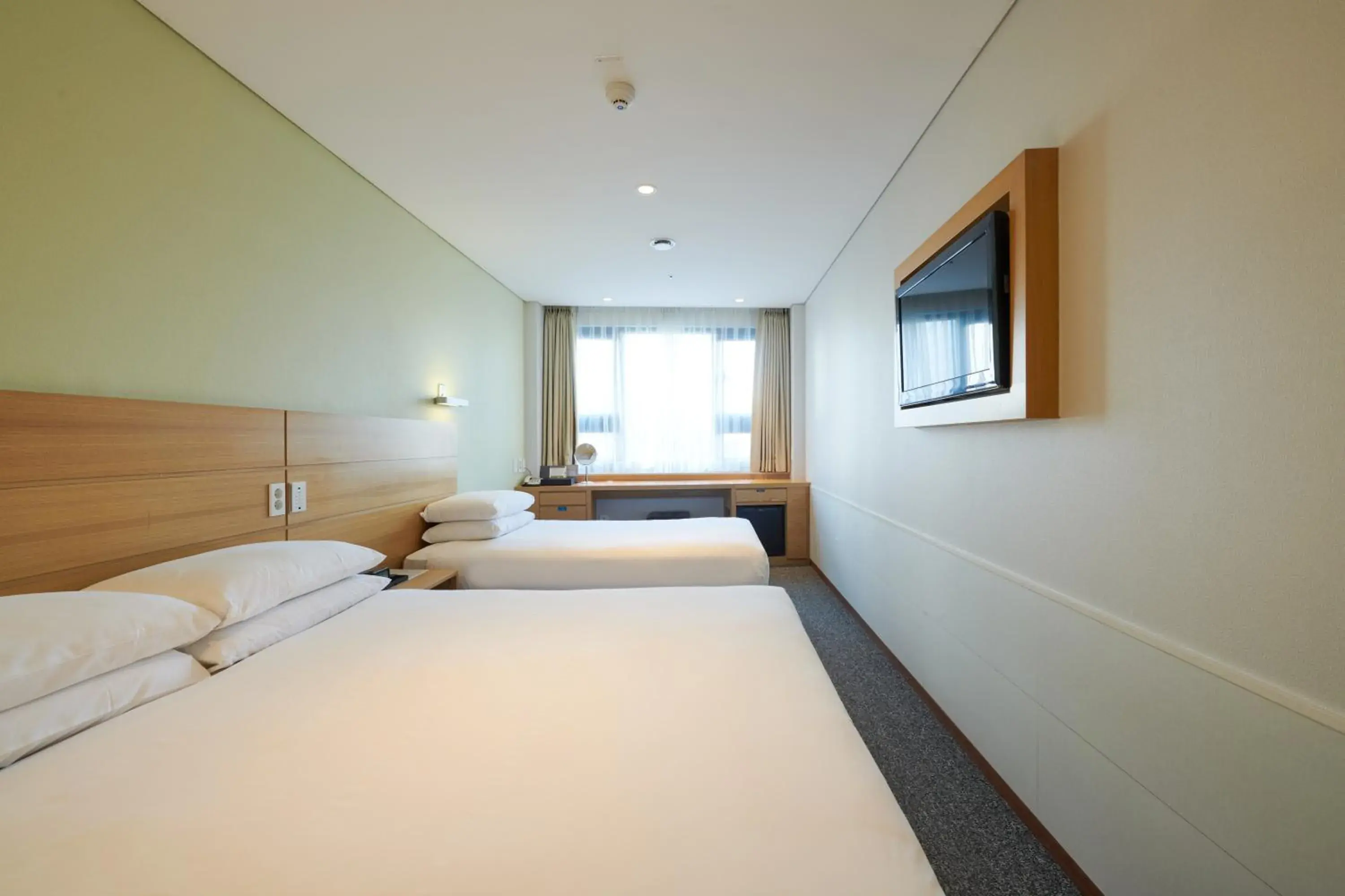 Bed in Nine Tree Hotel Myeongdong