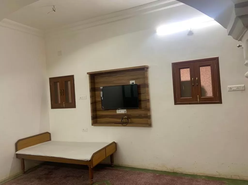 Bed in Hotel Swagatam