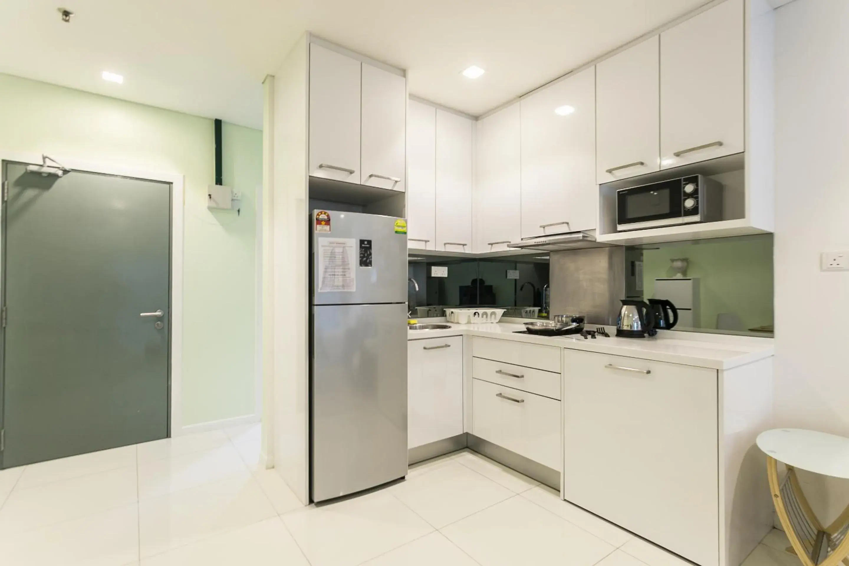 Kitchen or kitchenette, Kitchen/Kitchenette in Mercu Summer Suite KLCC @ Penguin Homes