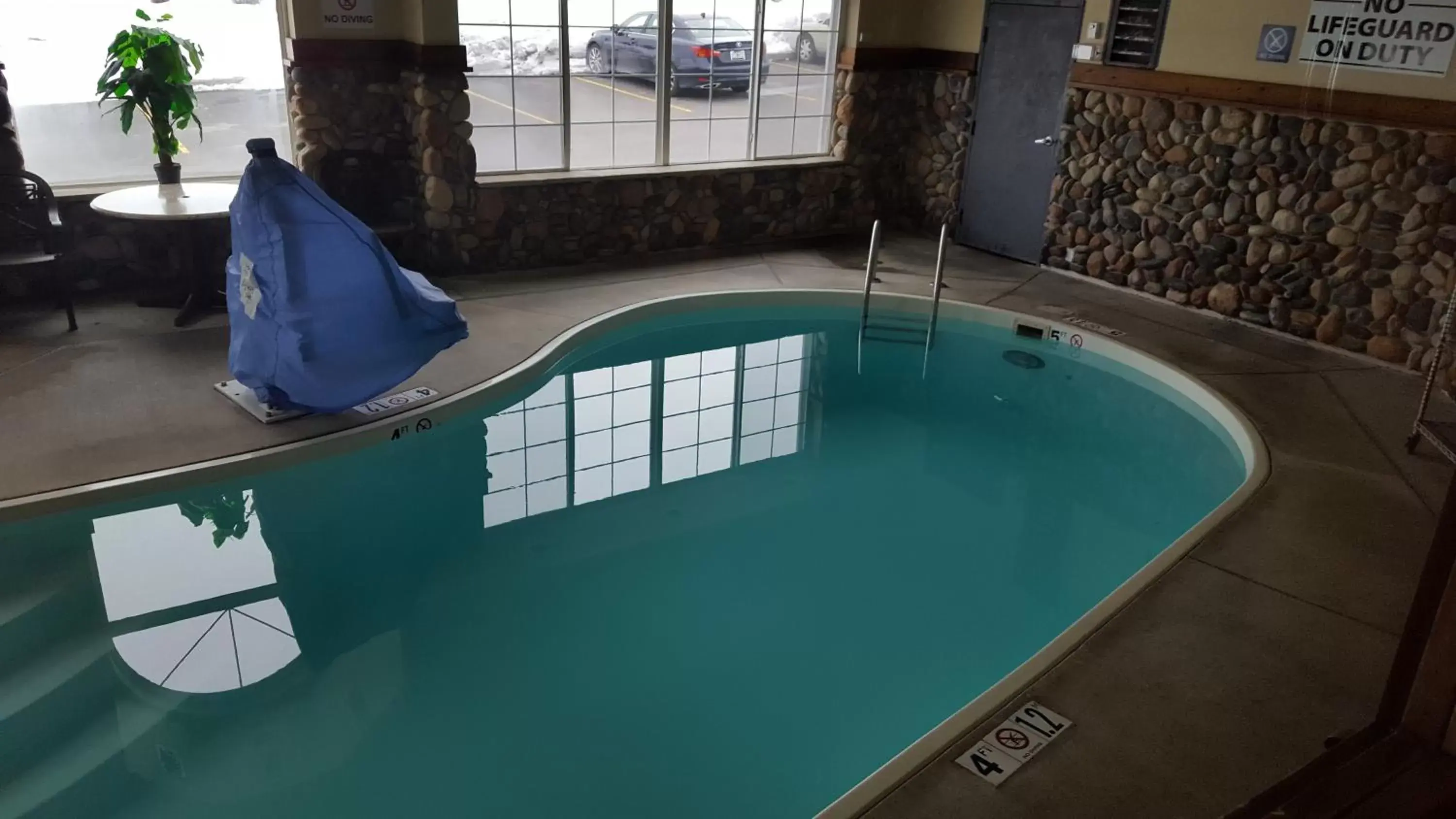 Swimming pool in Microtel Inn & Suites by Wyndham Bozeman Swimming pool in Microtel Inn & Suites by Wyndham Bozeman