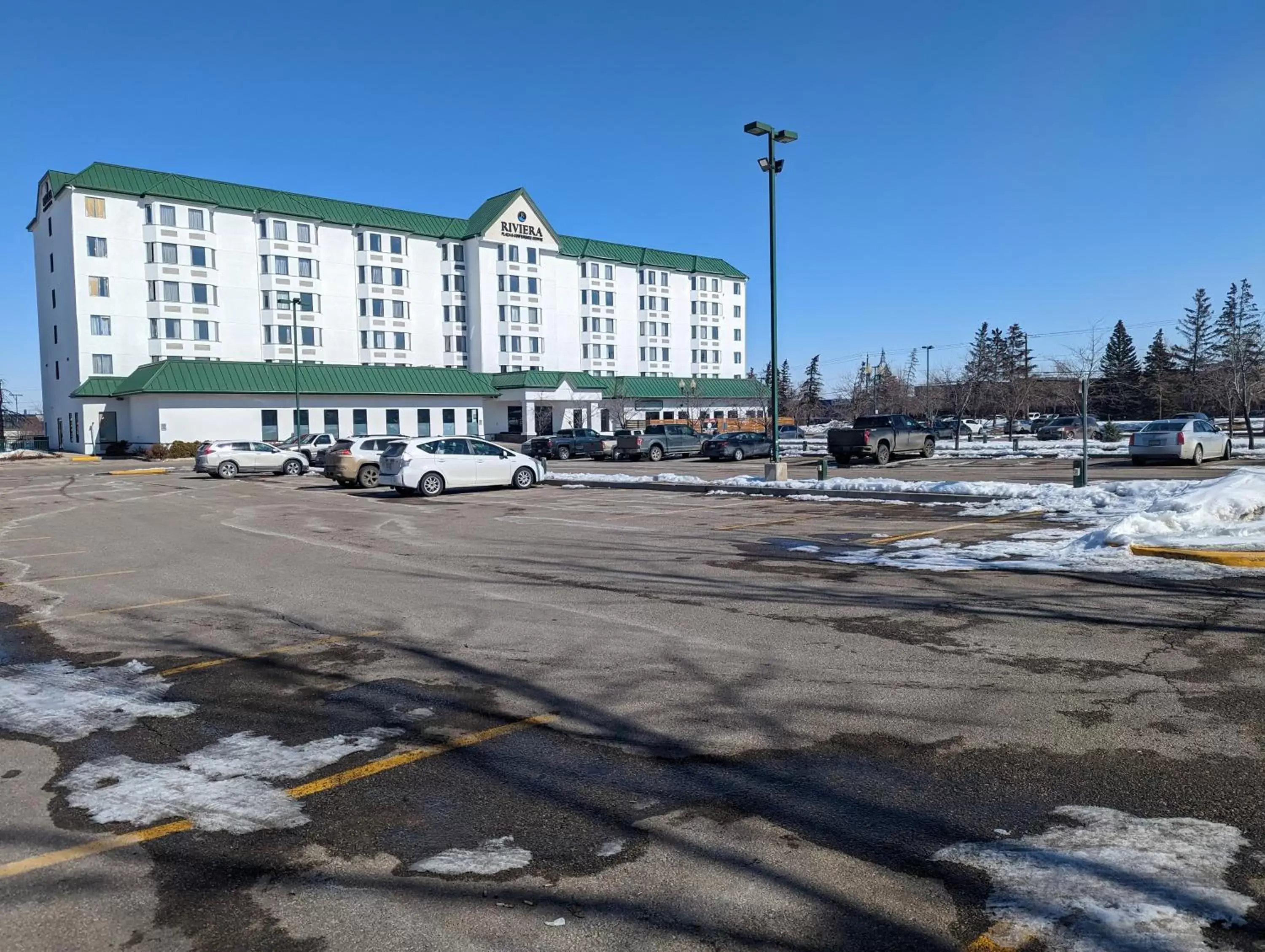 Parking, Property Building in DIVYA SUTRA Riviera Plaza and Conference Centre Calgary Airport