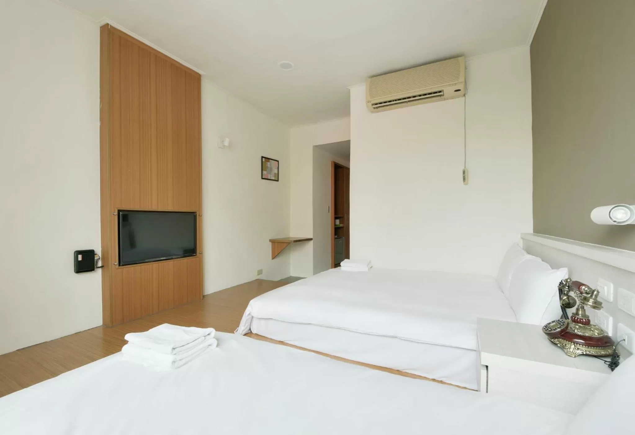 Bed in Raise Hotel Taichung