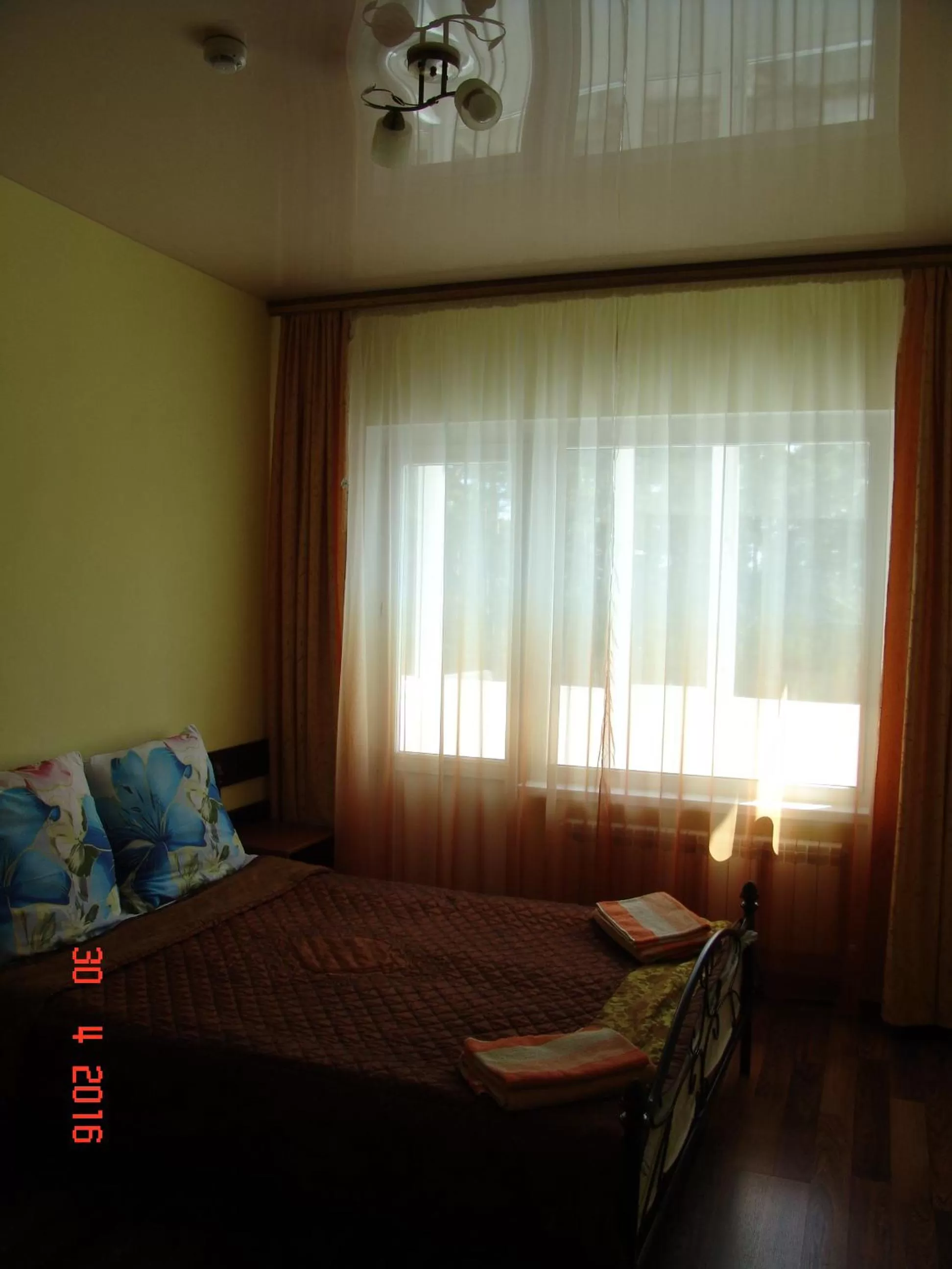 Bed in Zhaylau Hotel