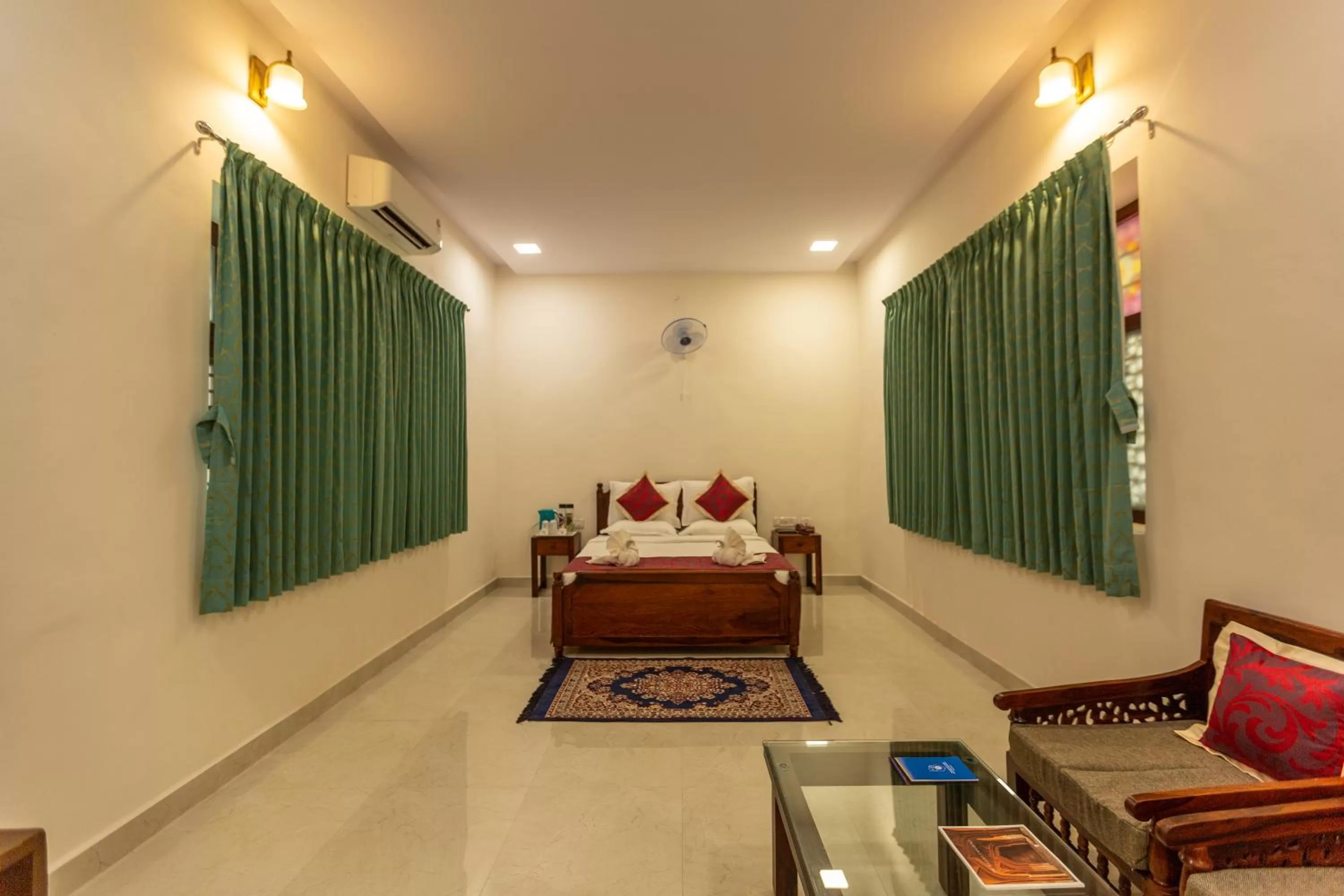 Bed in KSTDC Hotel Mayura Adilshahi Bijapur