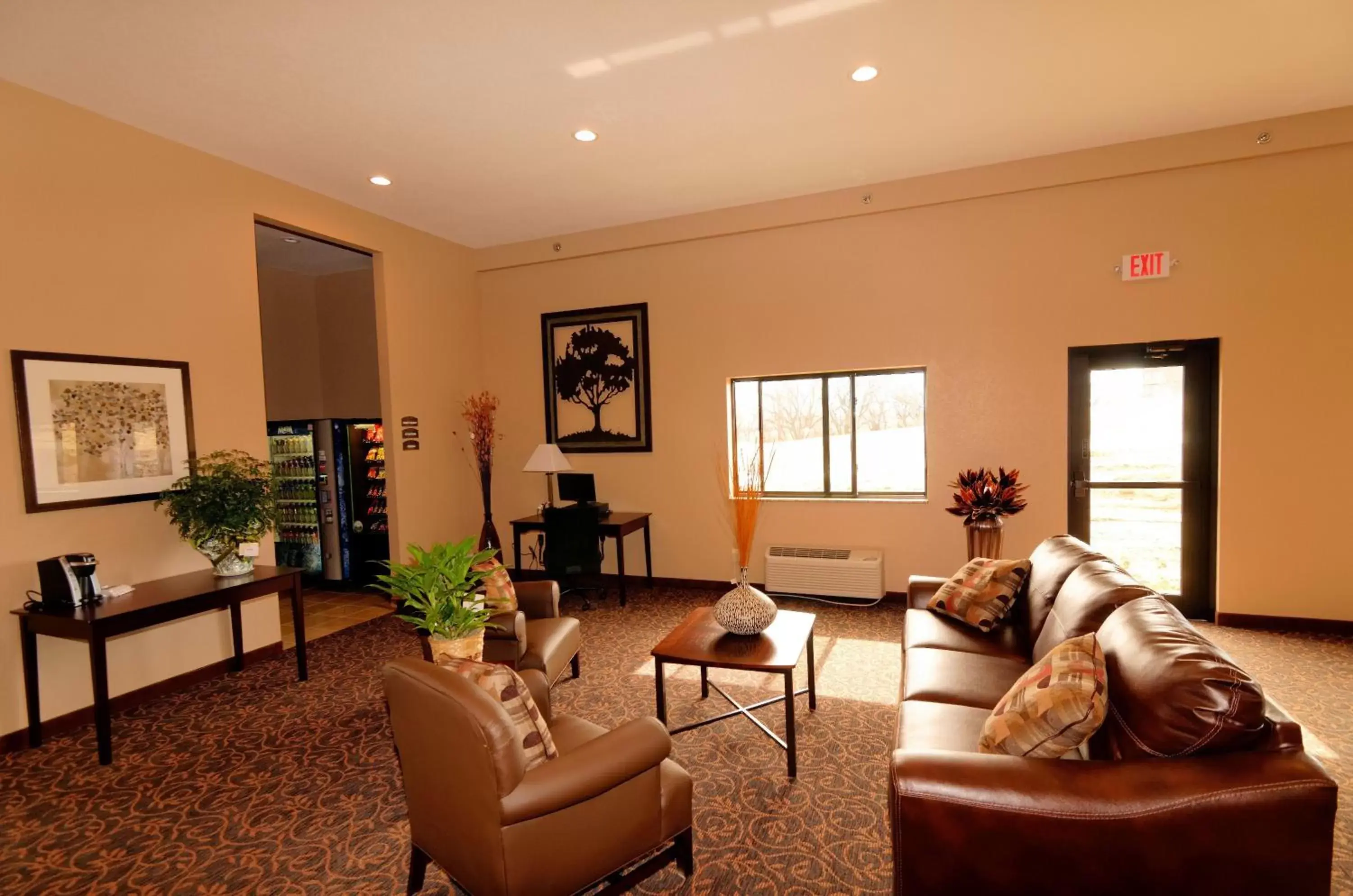 Lobby or reception, Seating Area in Cobblestone Inn & Suites - Denison | Oak Ridge