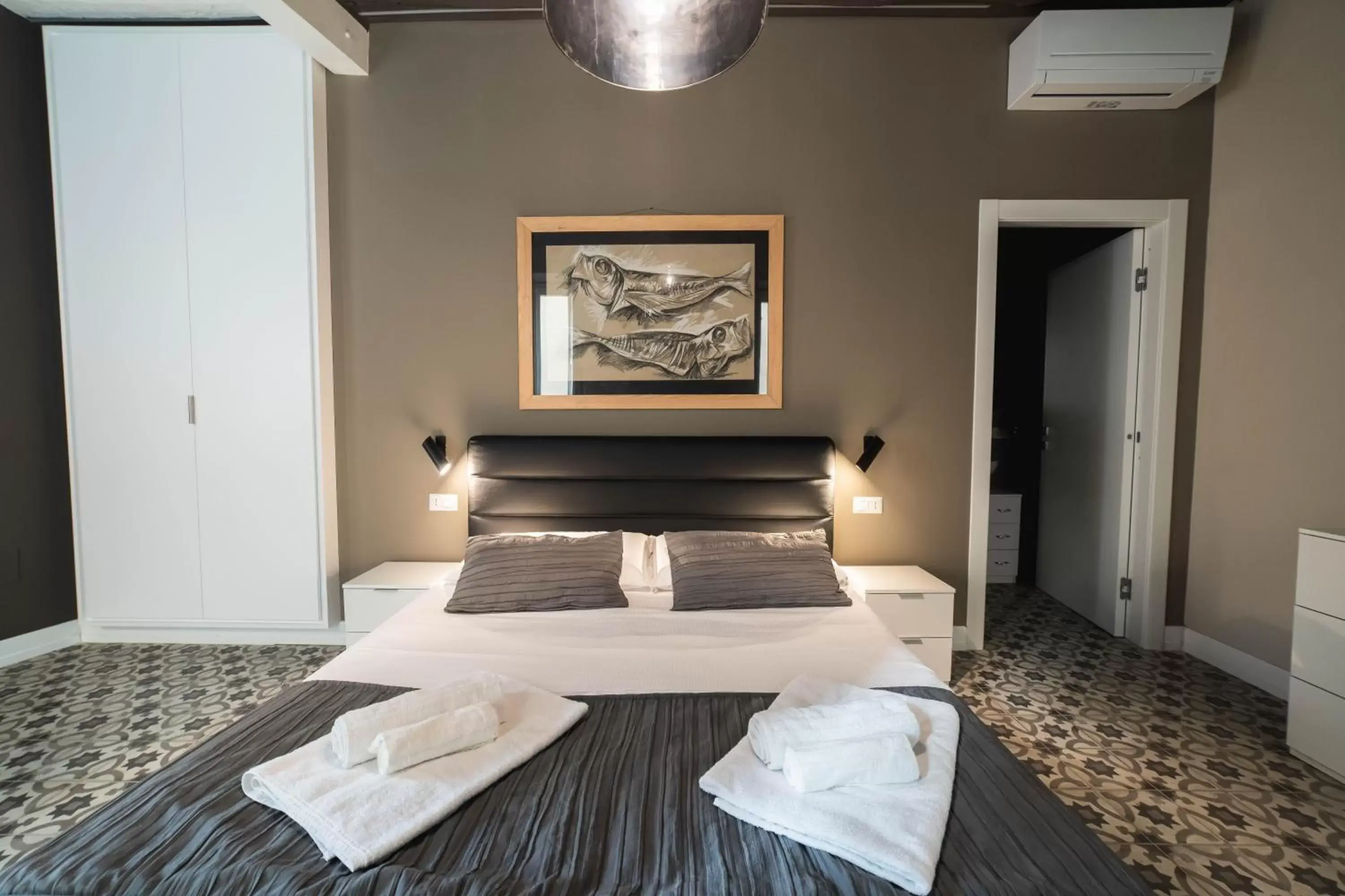 Bed in Palazzo Paladini - Luxury Suites in the Heart of the Old Town