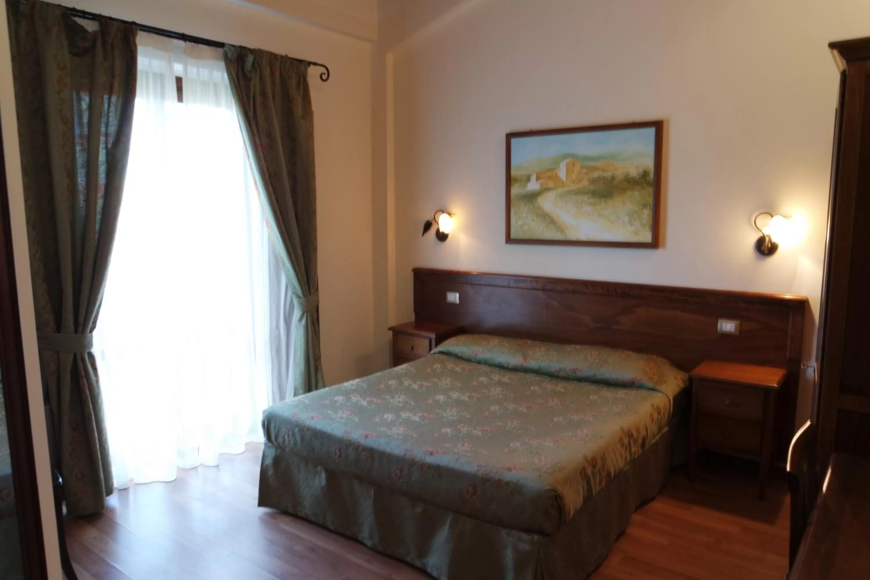 Photo of the whole room, Bed in Fonte Dei Tufi