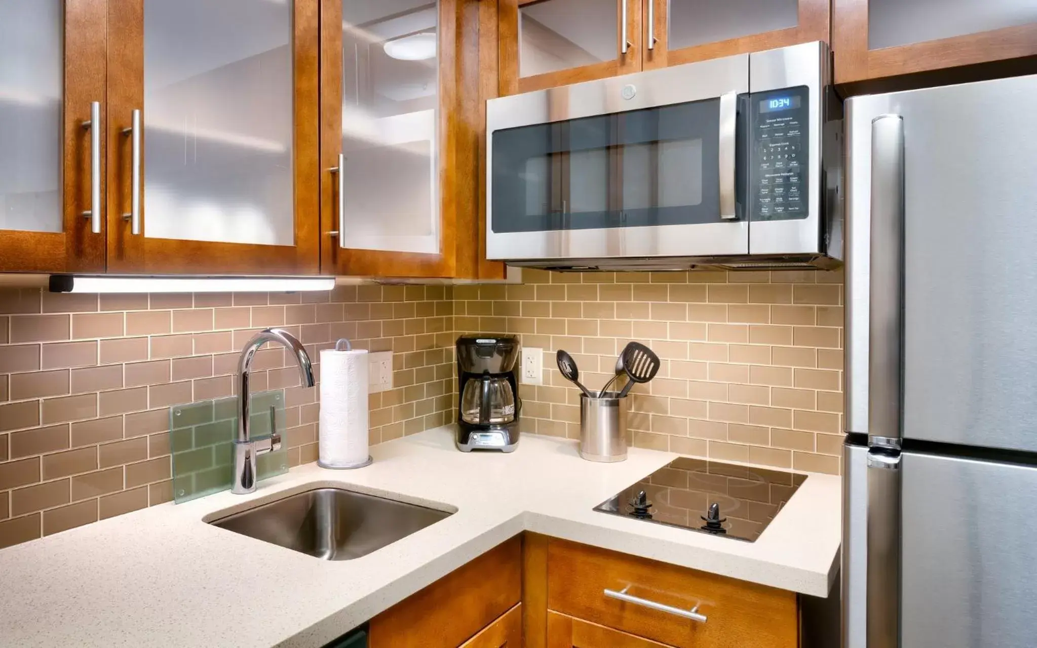 Photo of the whole room, Kitchen/Kitchenette in Staybridge Suites - Gainesville I-75, an IHG Hotel