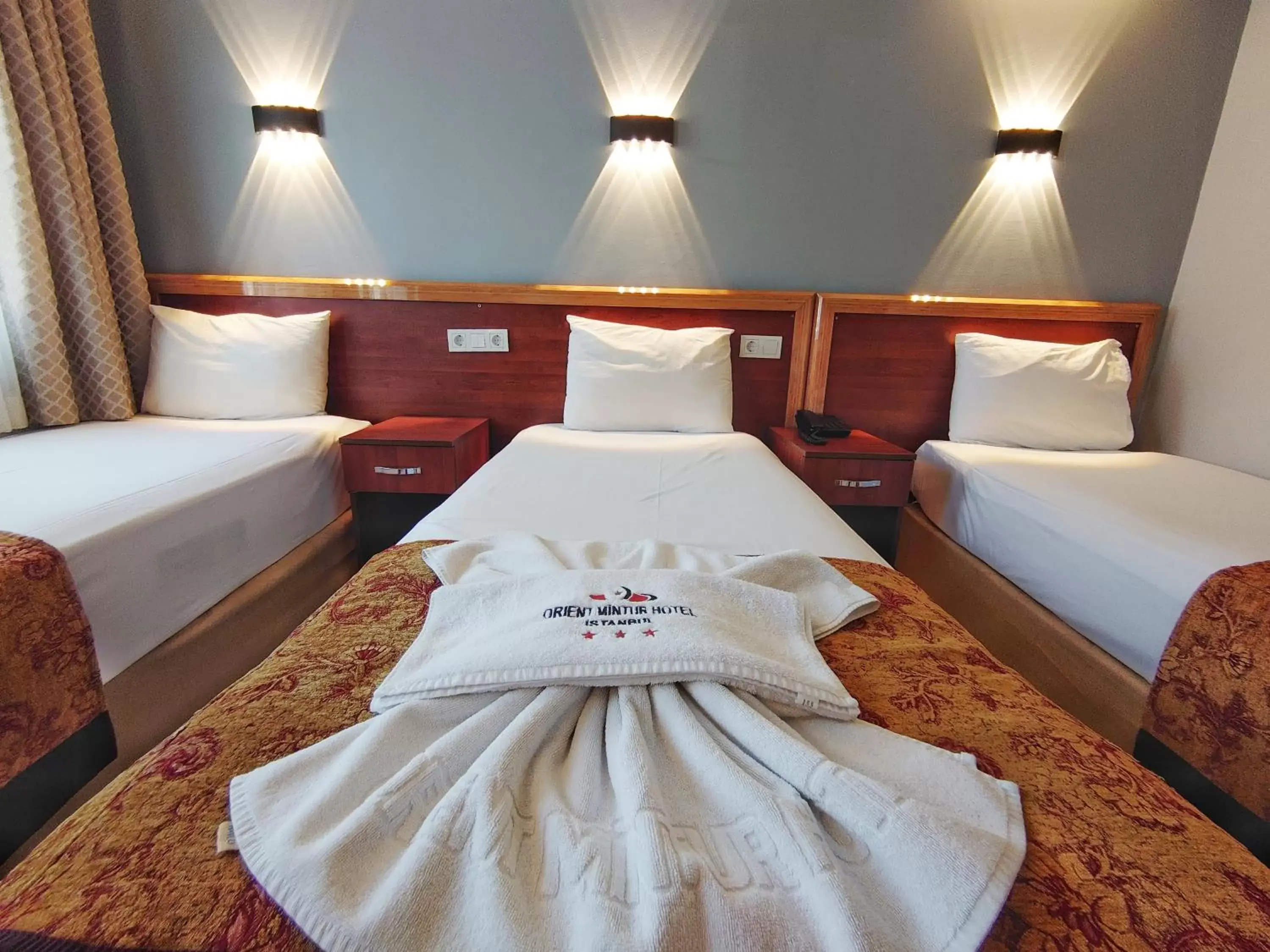 Bed in Orient Mintur Hotel