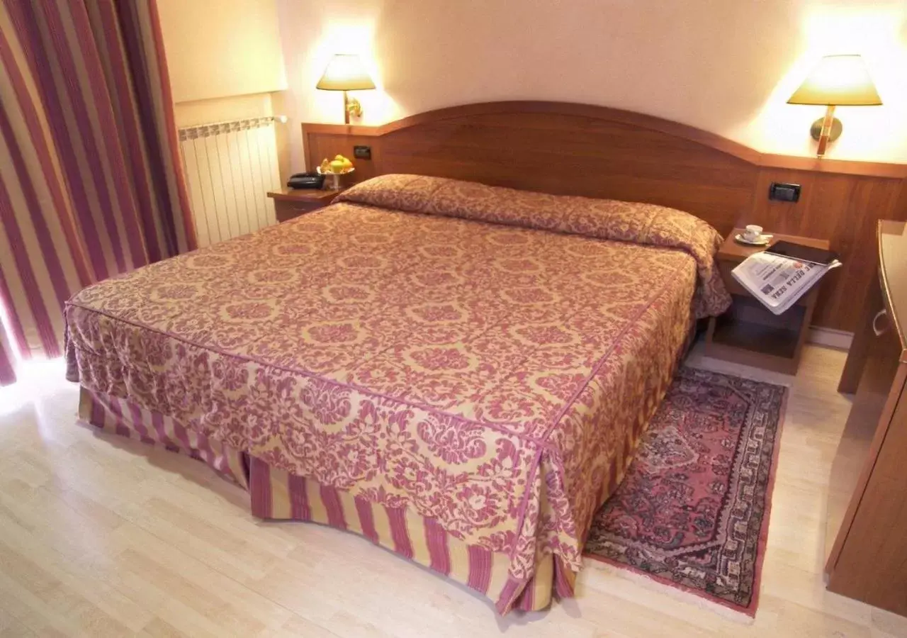 Bed in Coccodrillo Hotel & Apartments