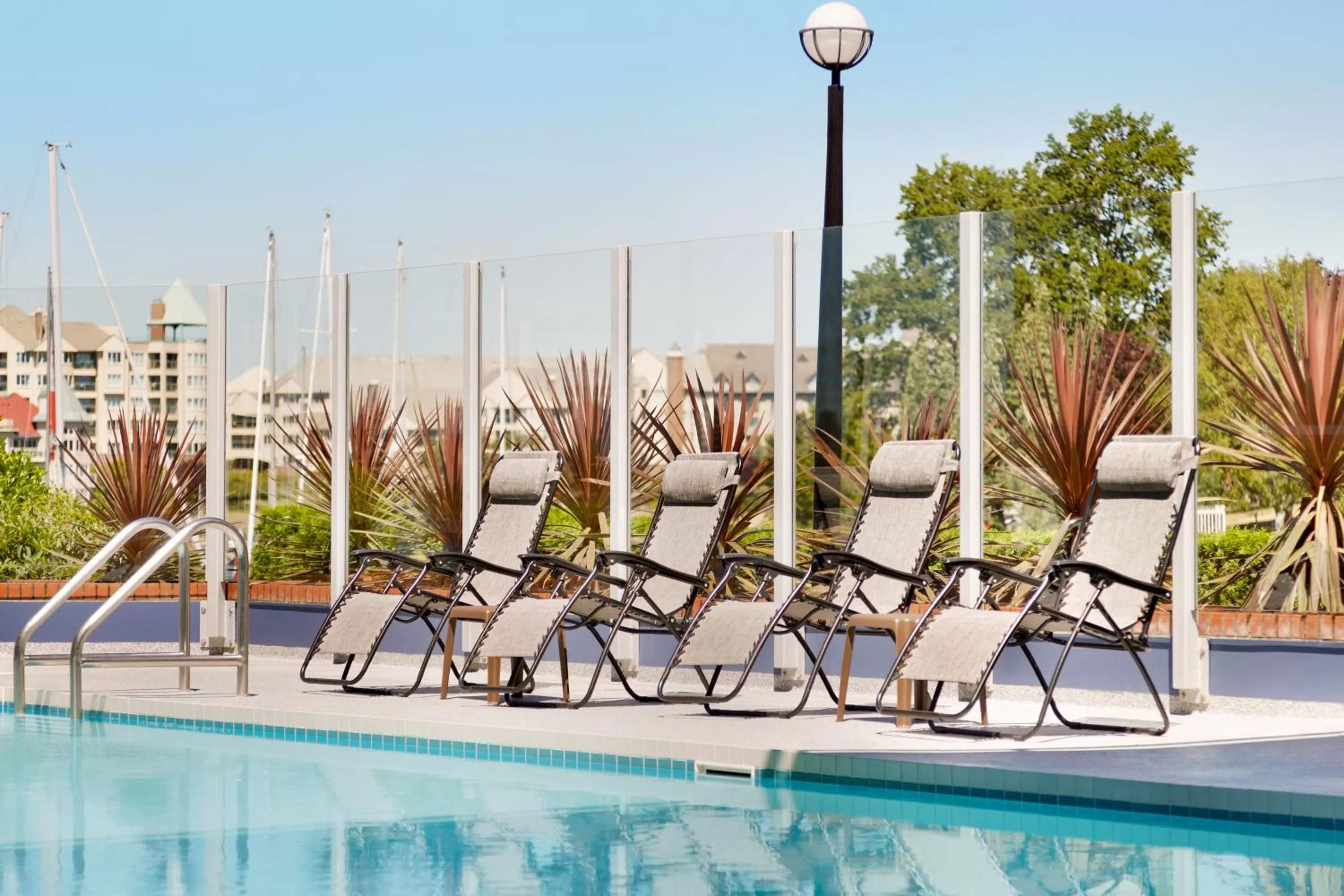 Swimming pool in Coast Victoria Hotel & Marina by APA