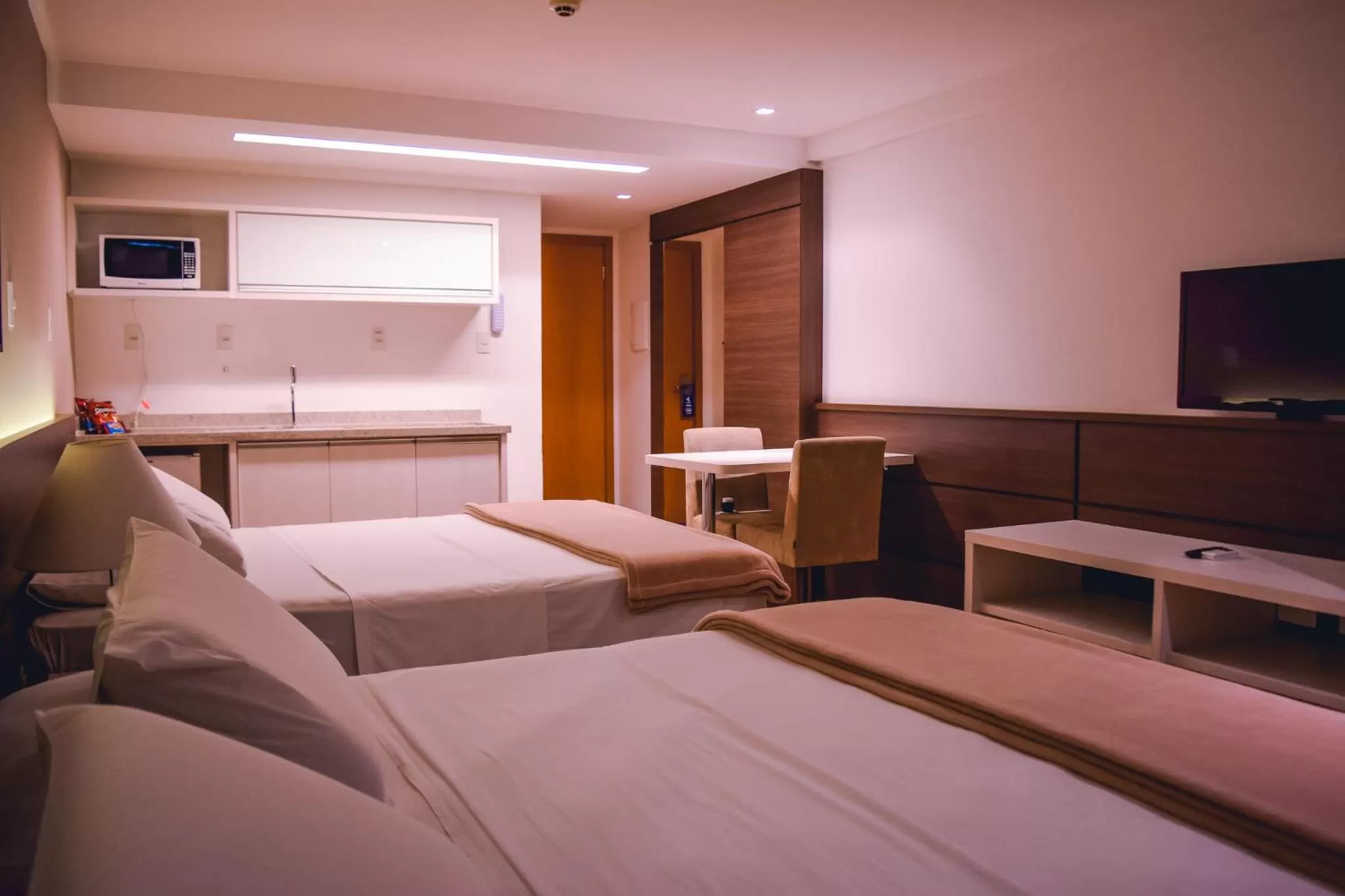 Bed in Atmosfera Hotel
