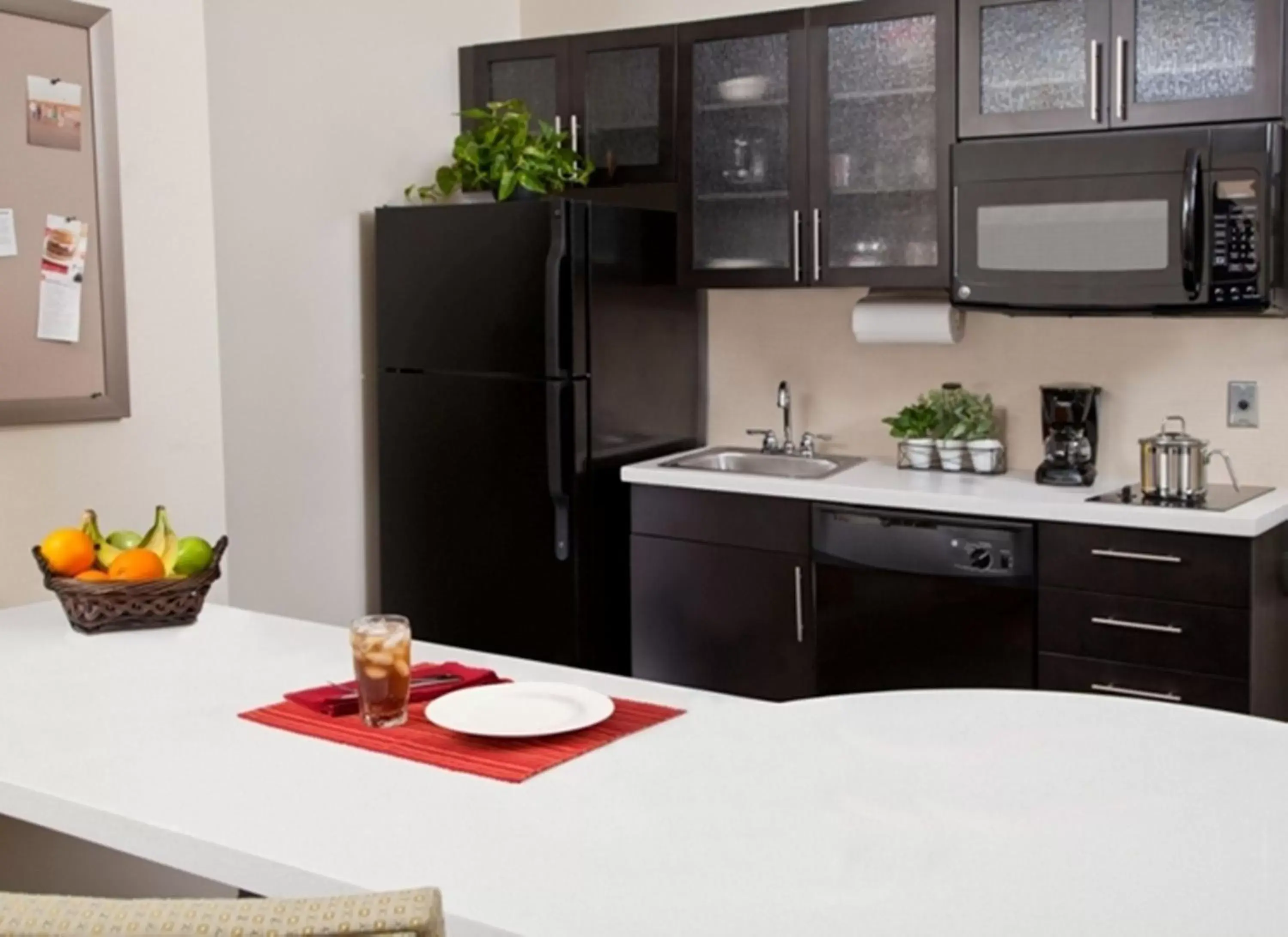 Photo of the whole room, Kitchen/Kitchenette in Candlewood Suites Grove City - Outlet Center, an IHG Hotel